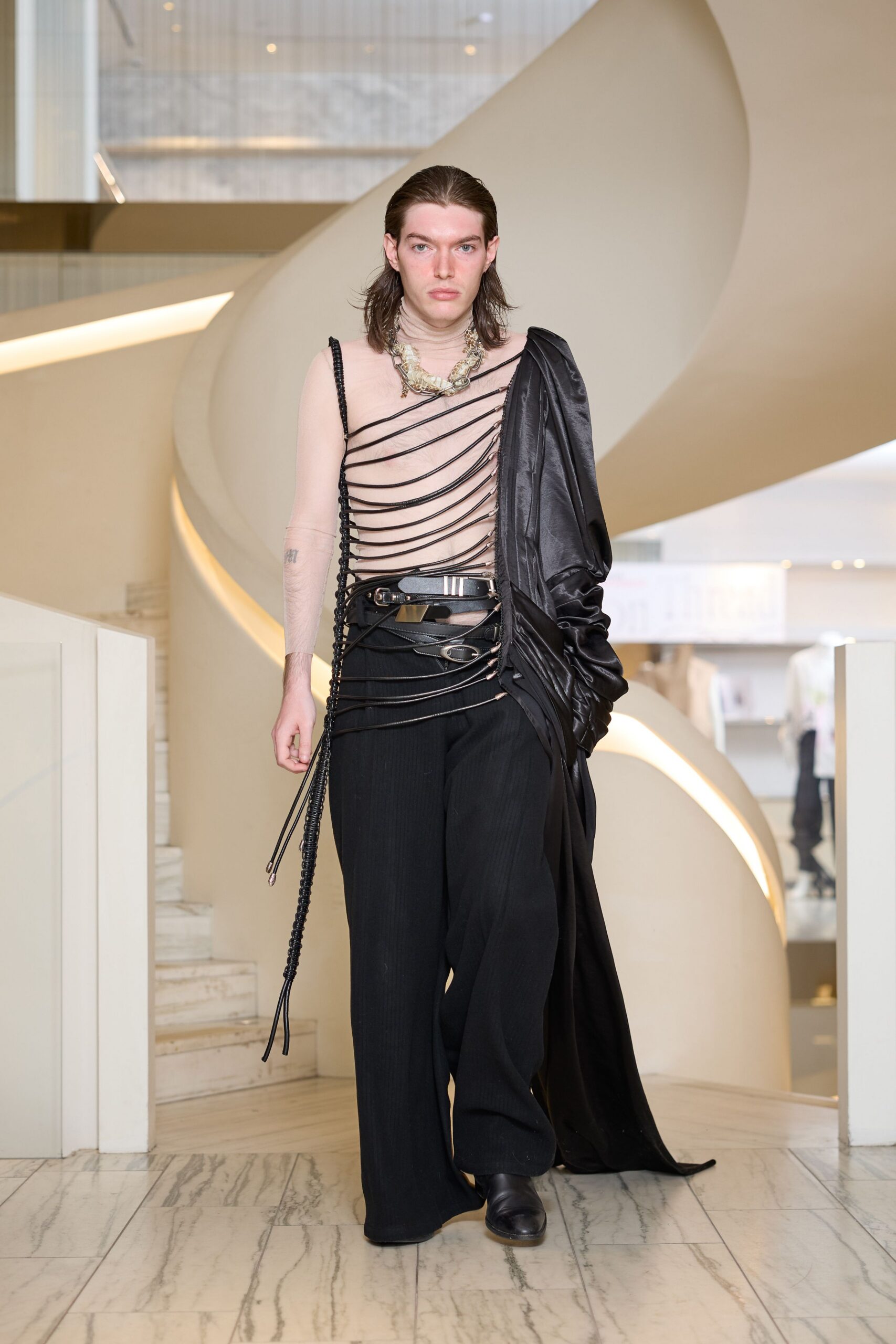black layered top with wide-leg pants