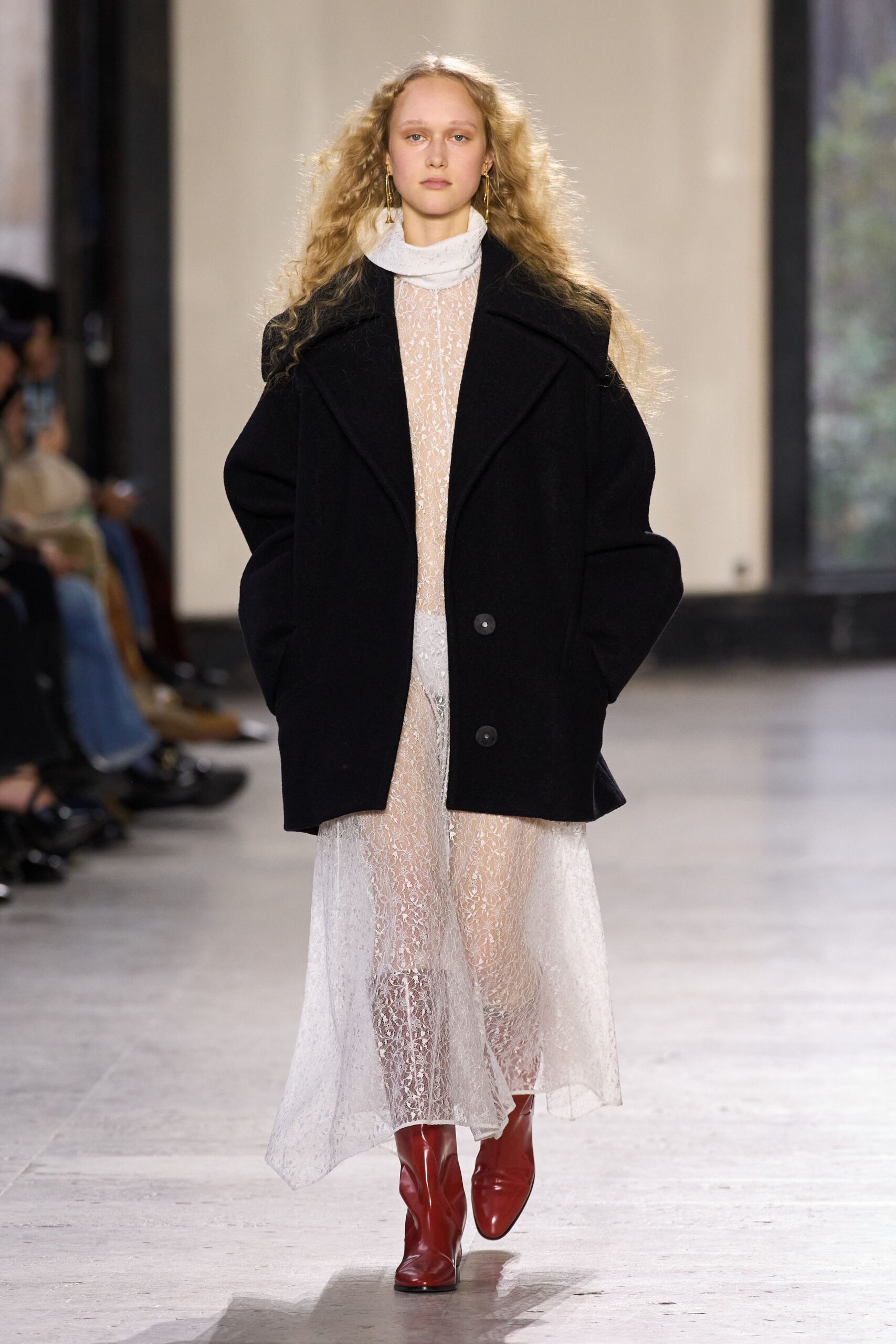 black wool long-sleeve collared oversized buttoned coat