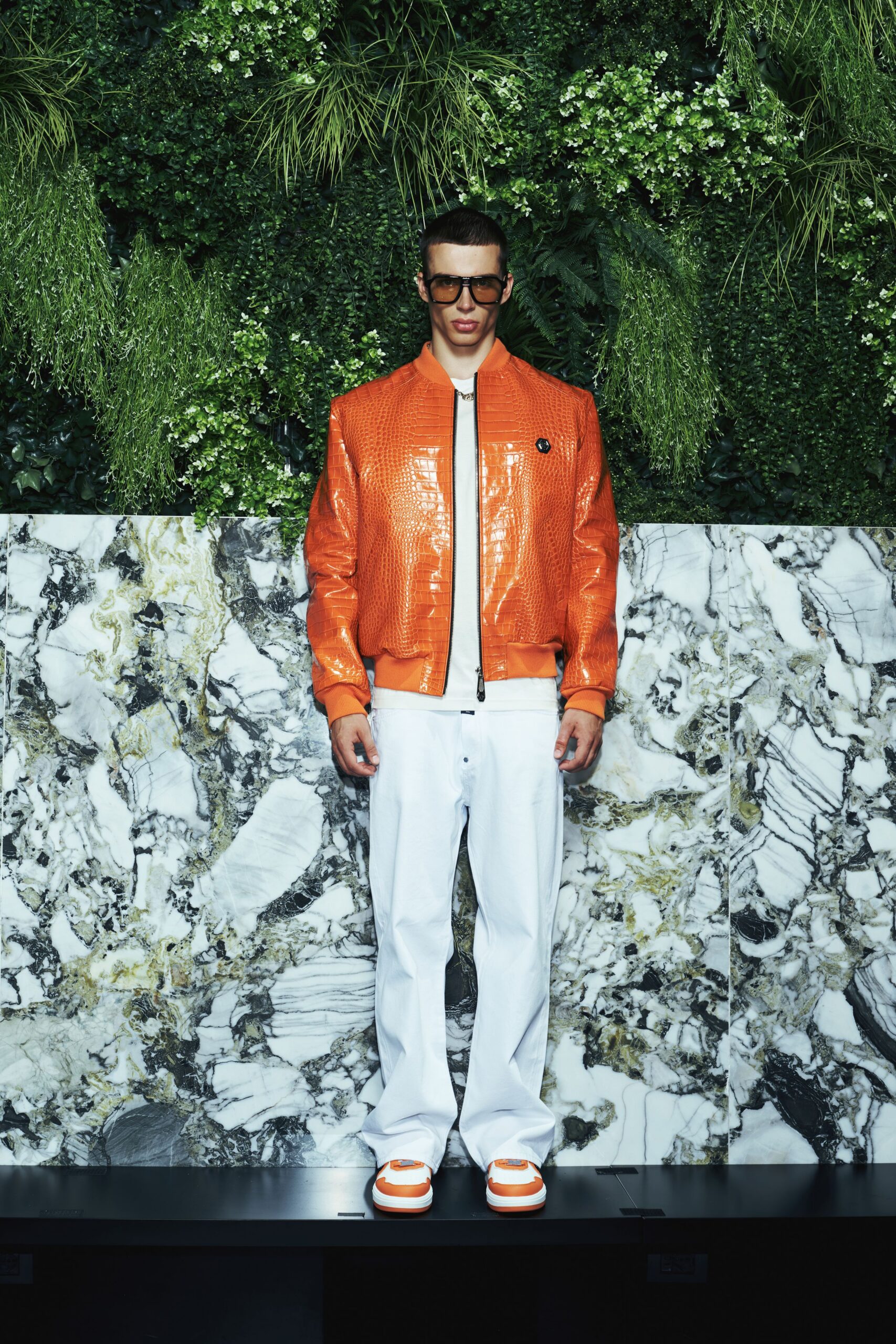 orange vinyl long-sleeve collared fitted zippered shiny jacket