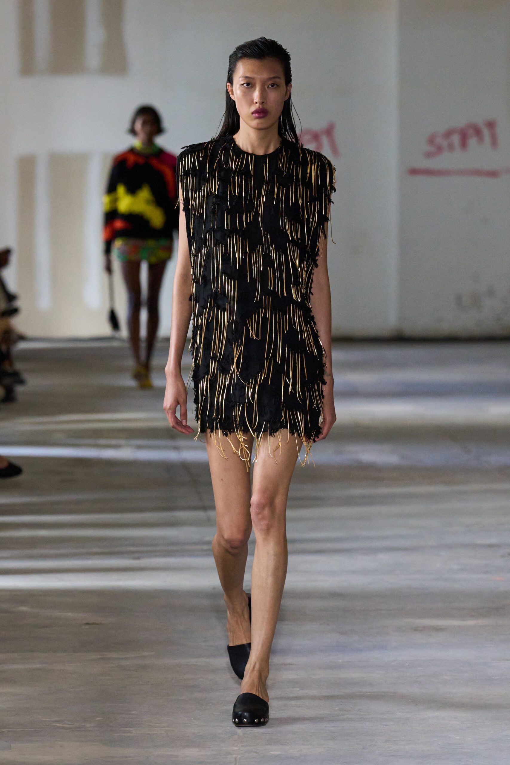 black fringed mini dress with shoes