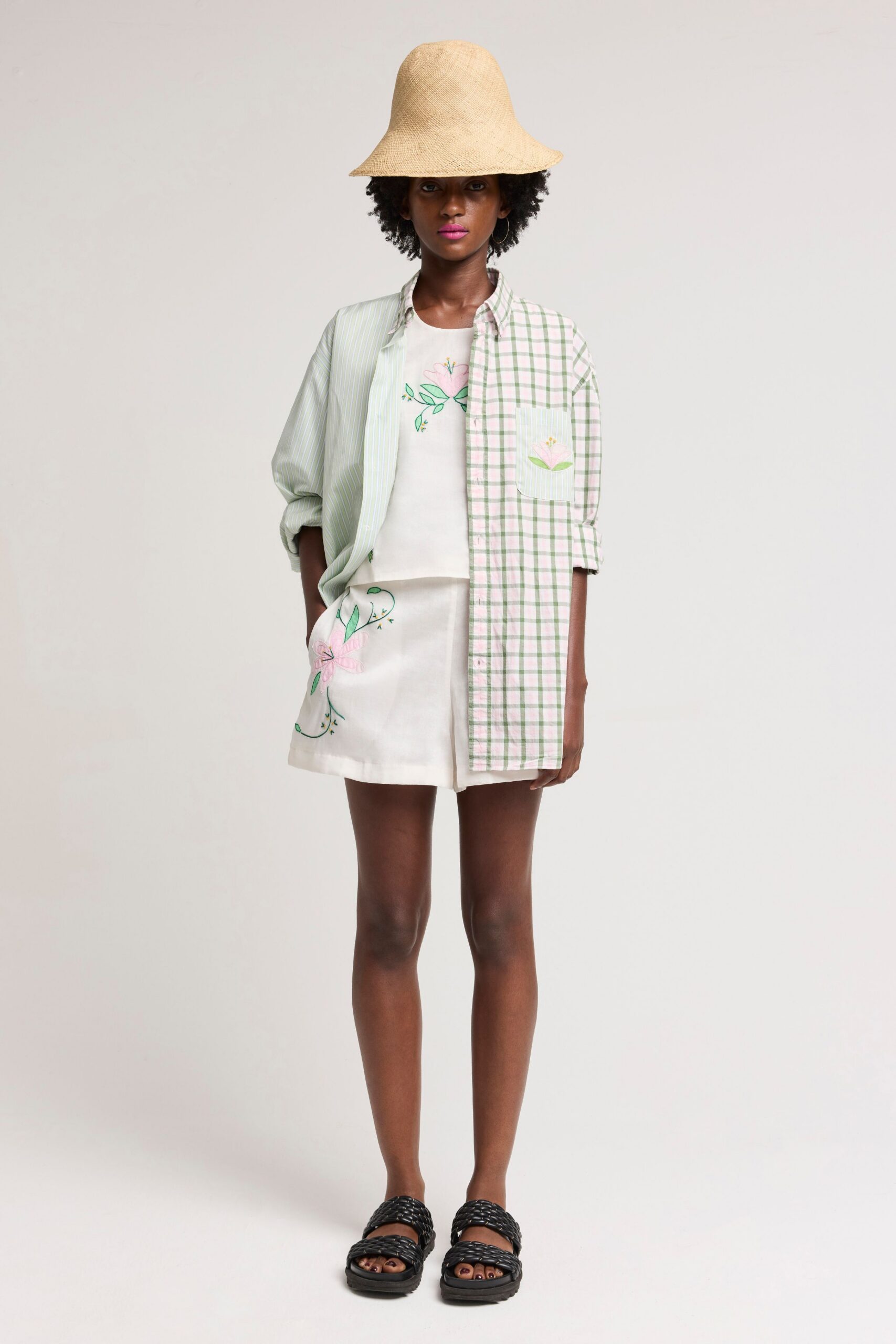 green and white checked shirt with beige mini skirt