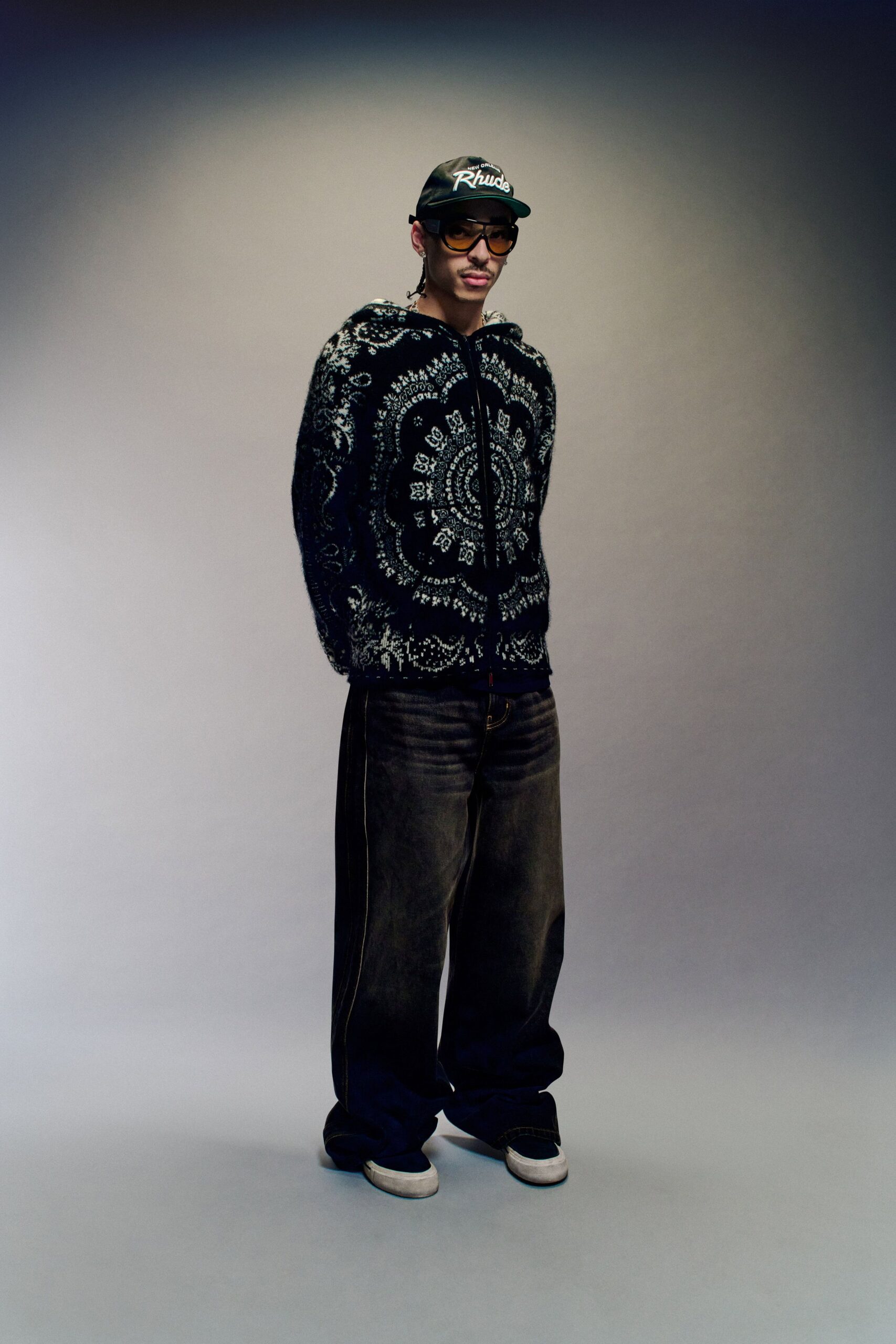 black cotton long-sleeve relaxed zippered printed sweater