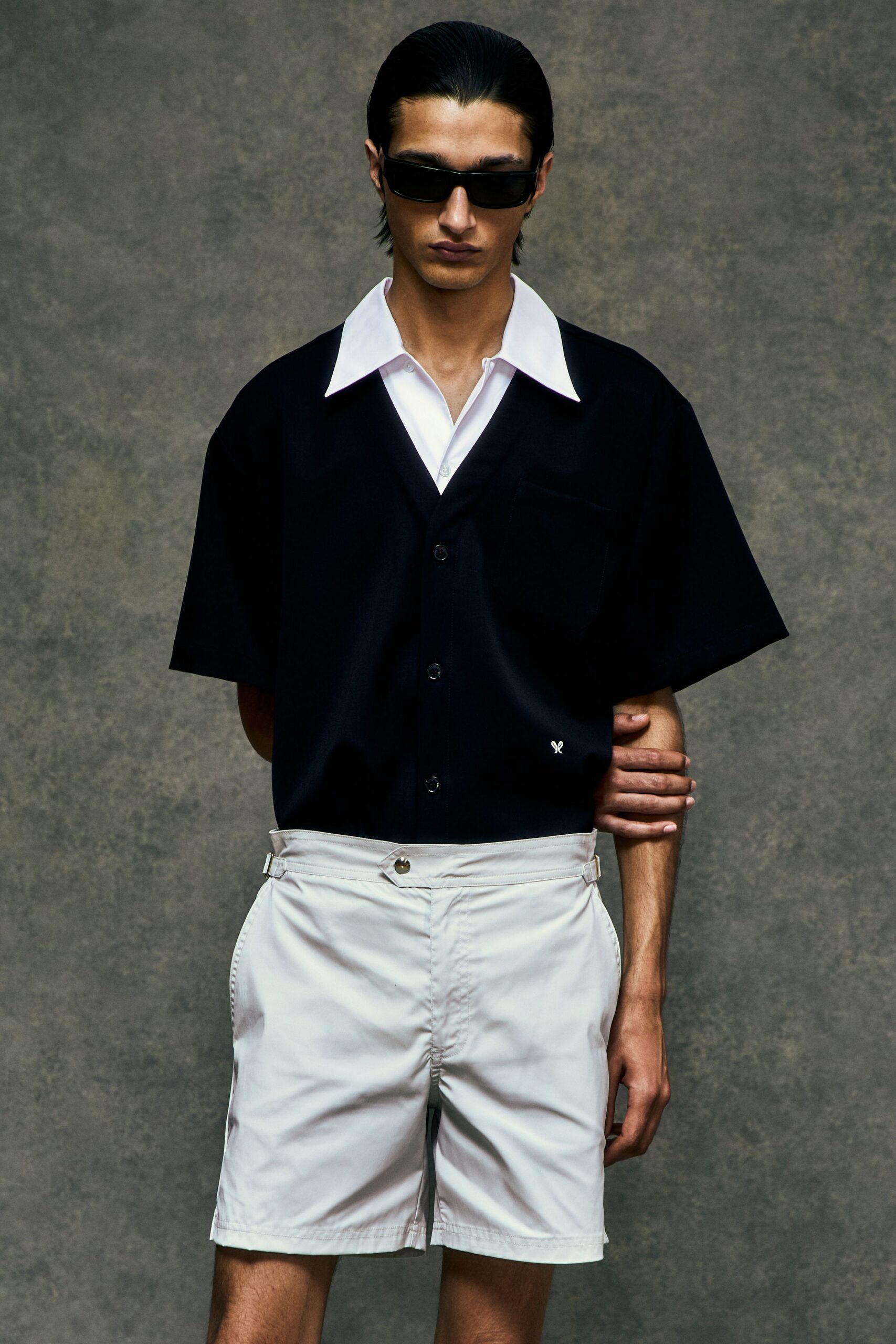 black relaxed shirt white shorts