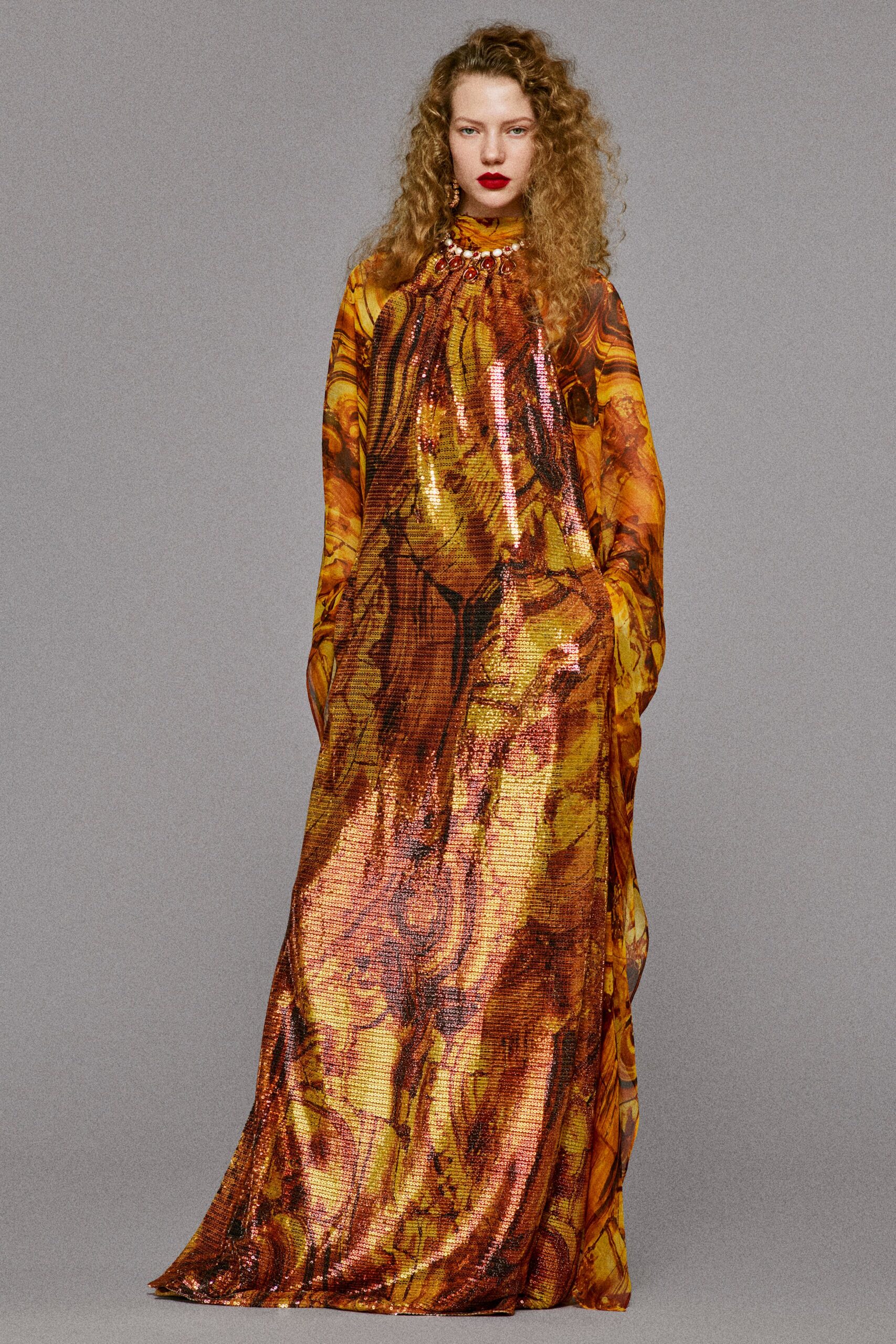 orange gold sequined long-sleeve gown