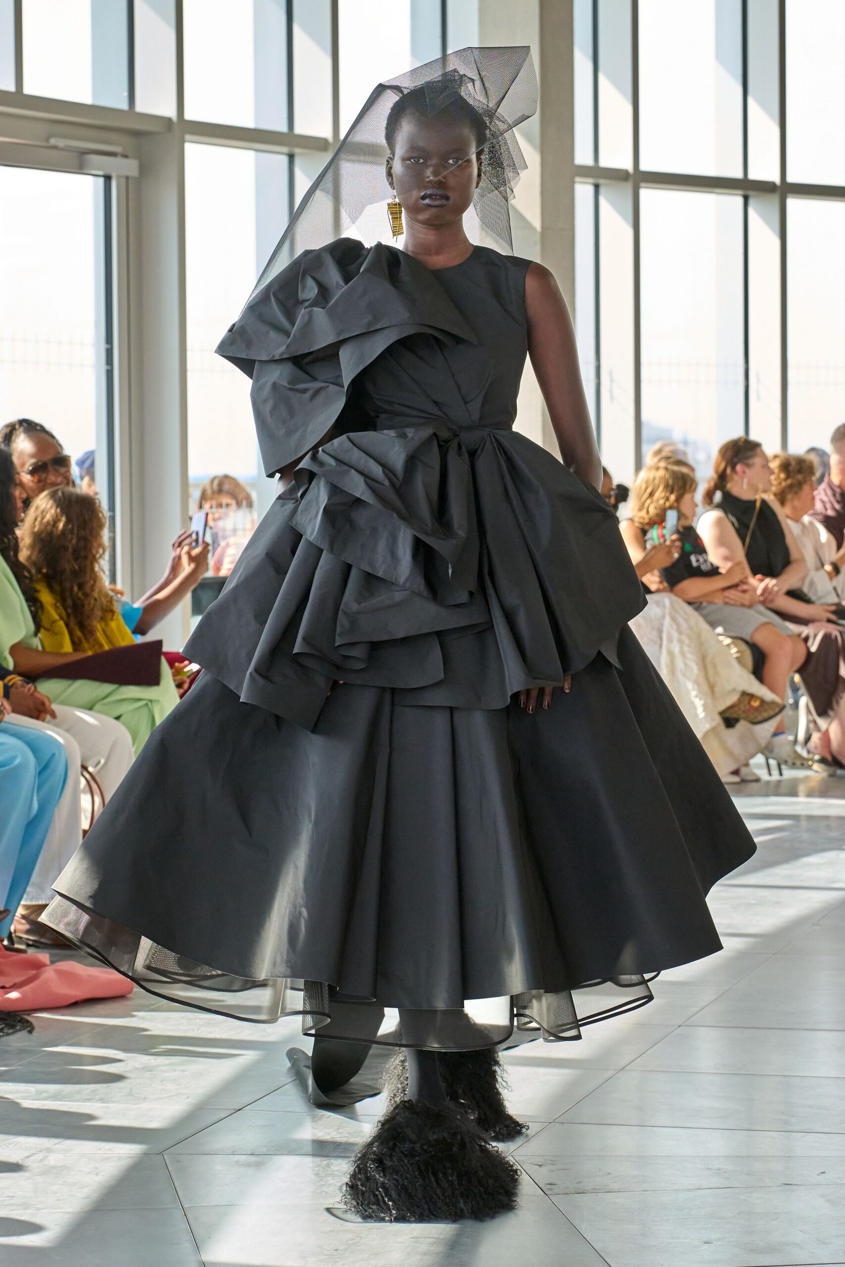 black ruffled midi dress with fur shoes