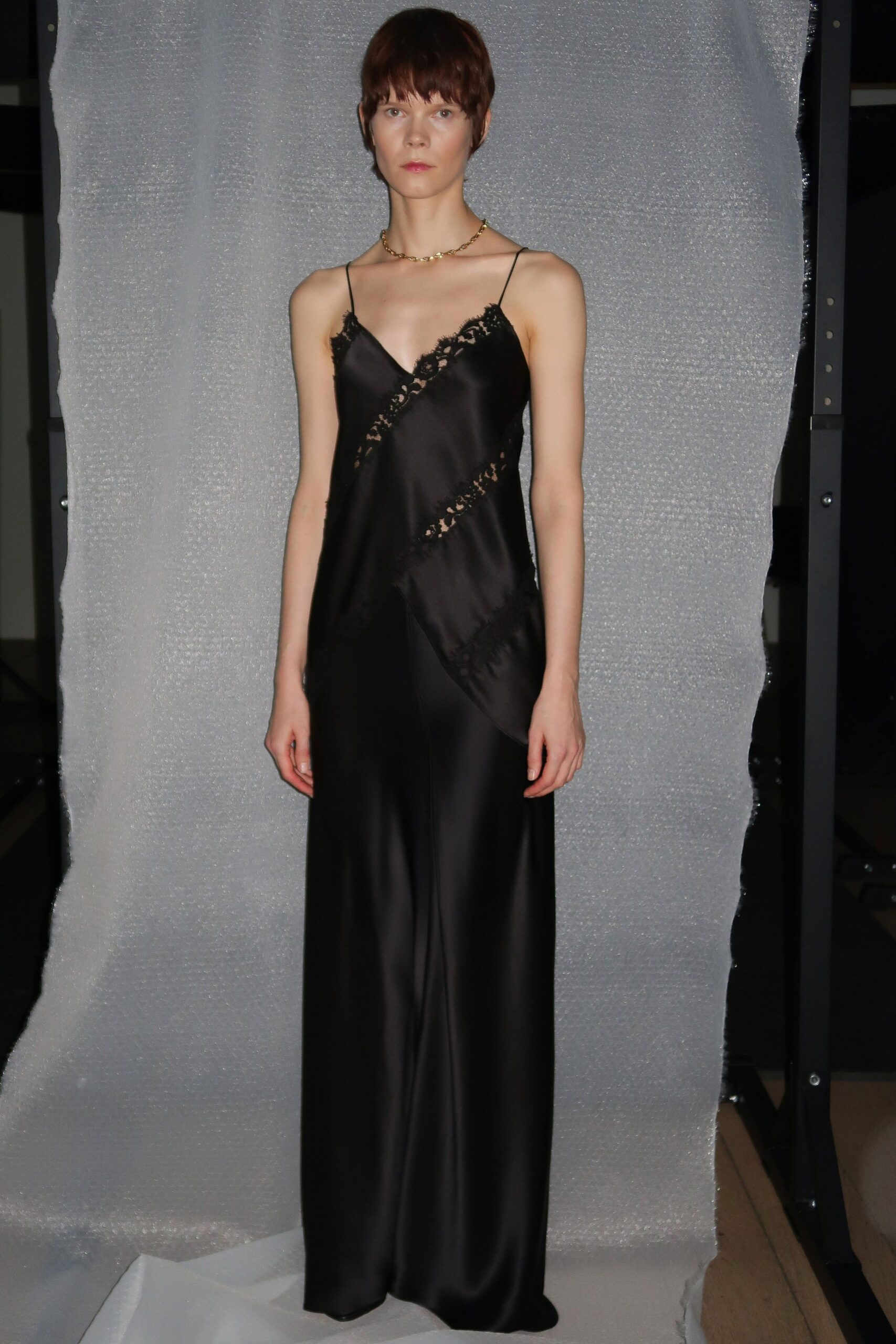 black silk sleeveless gown