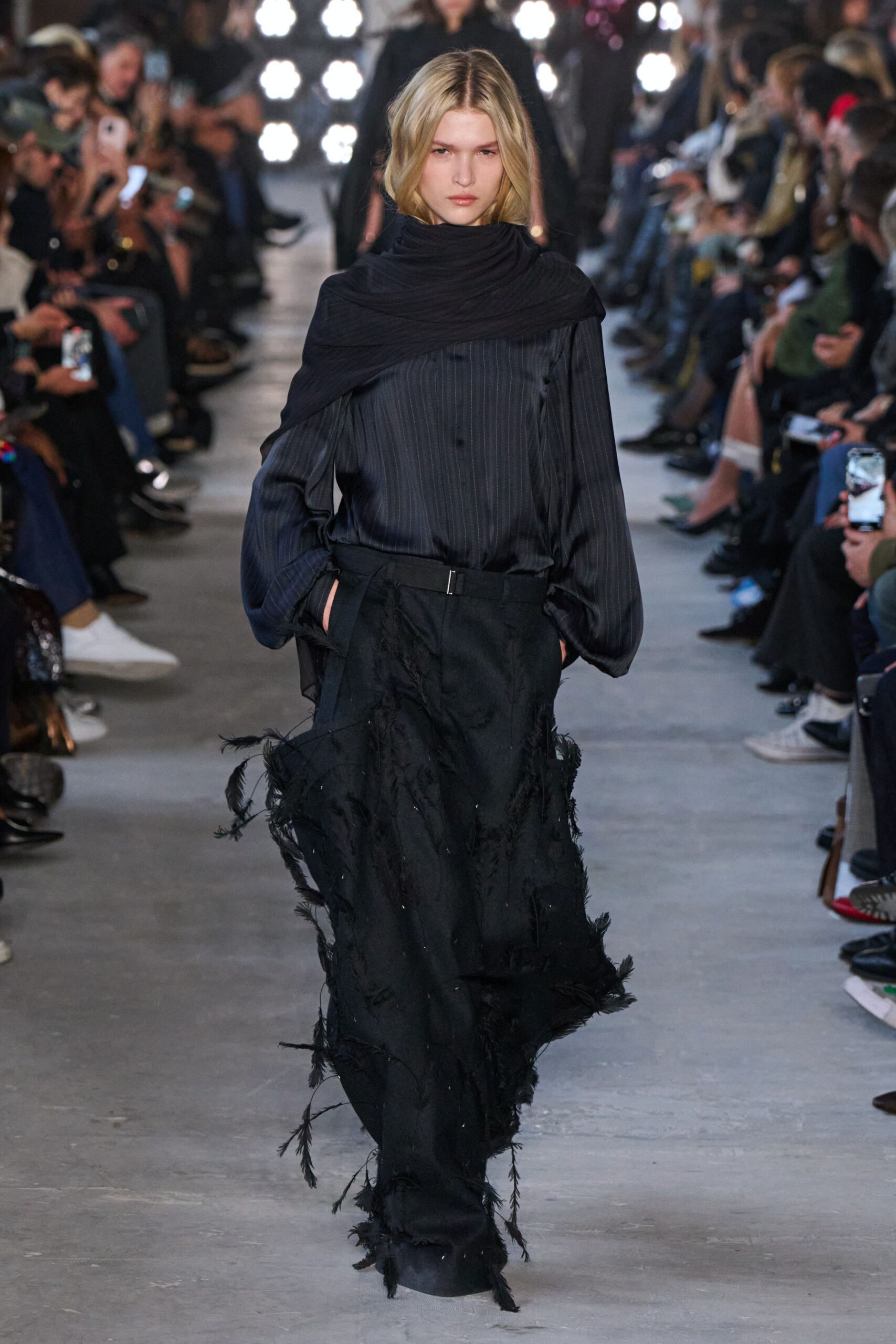 black silk shirt and distressed pants