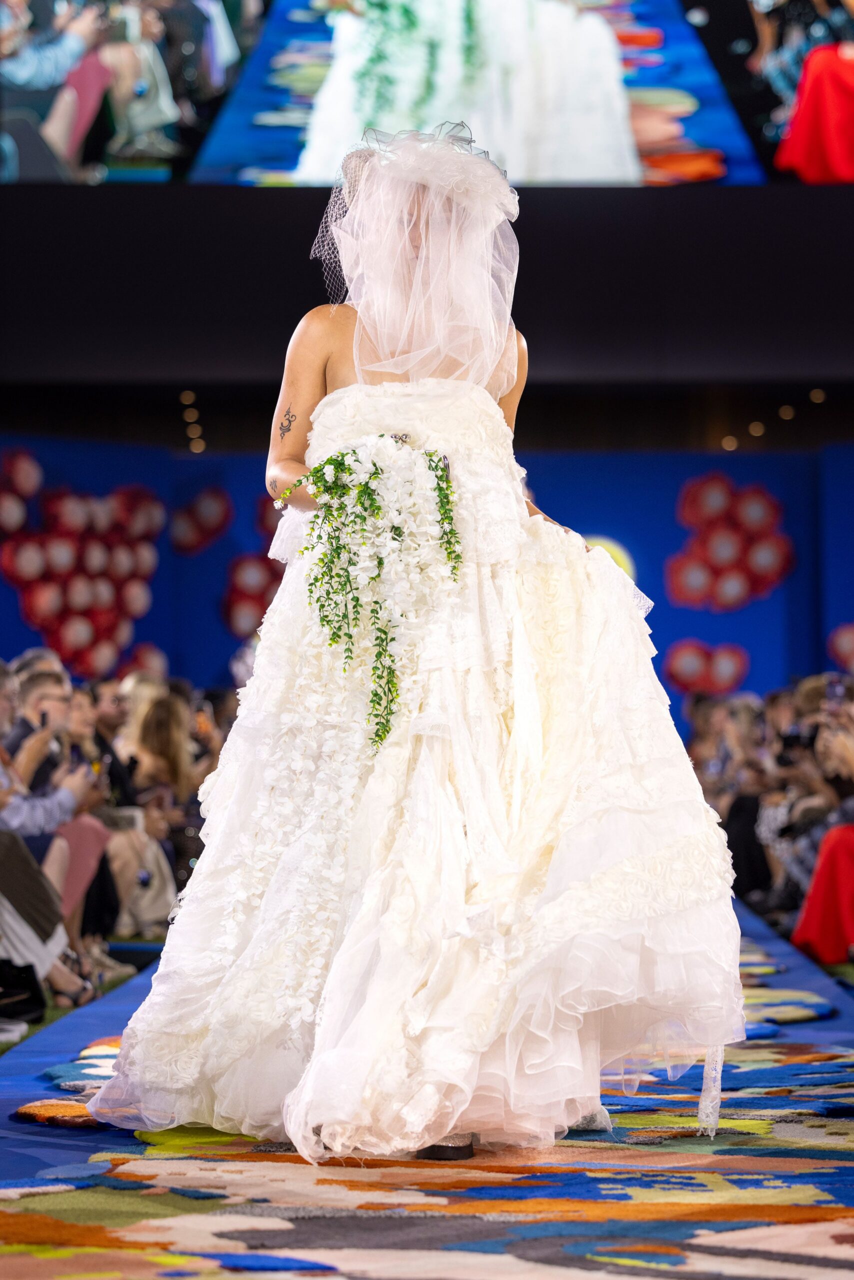 white strapless ruffled gown