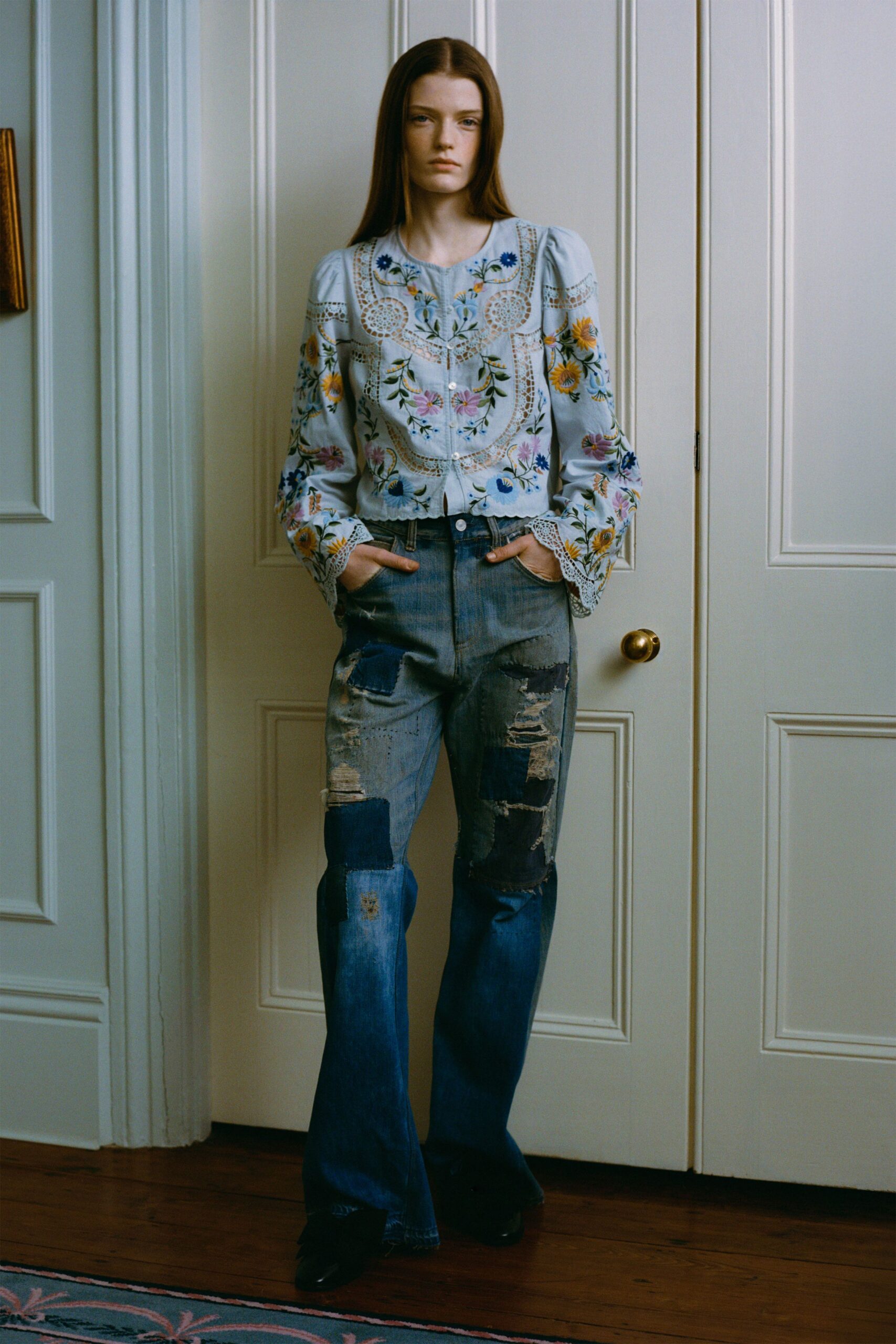 embroidered white shirt with distressed jeans