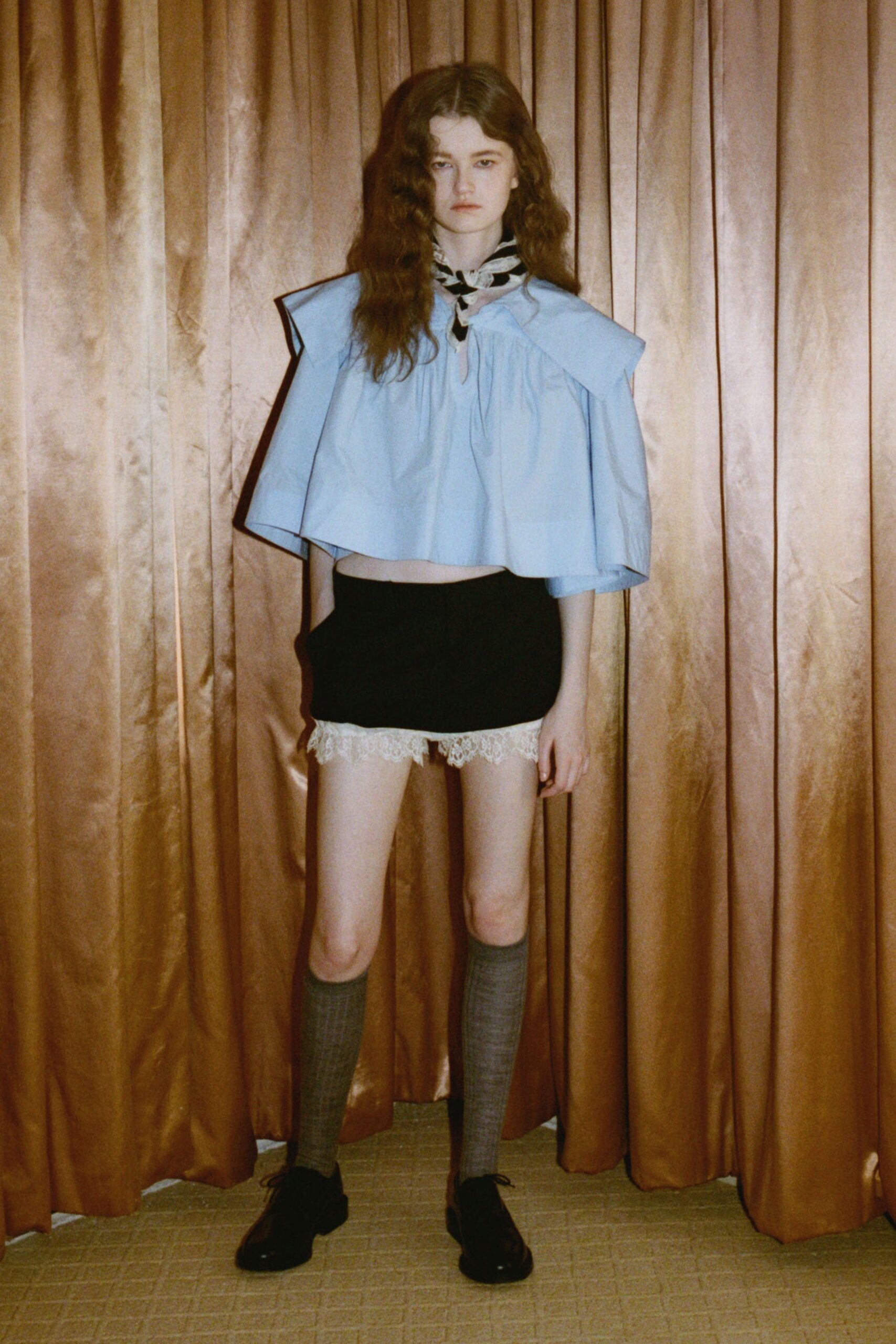 blue cotton sleeveless collared fitted layered cropped top
