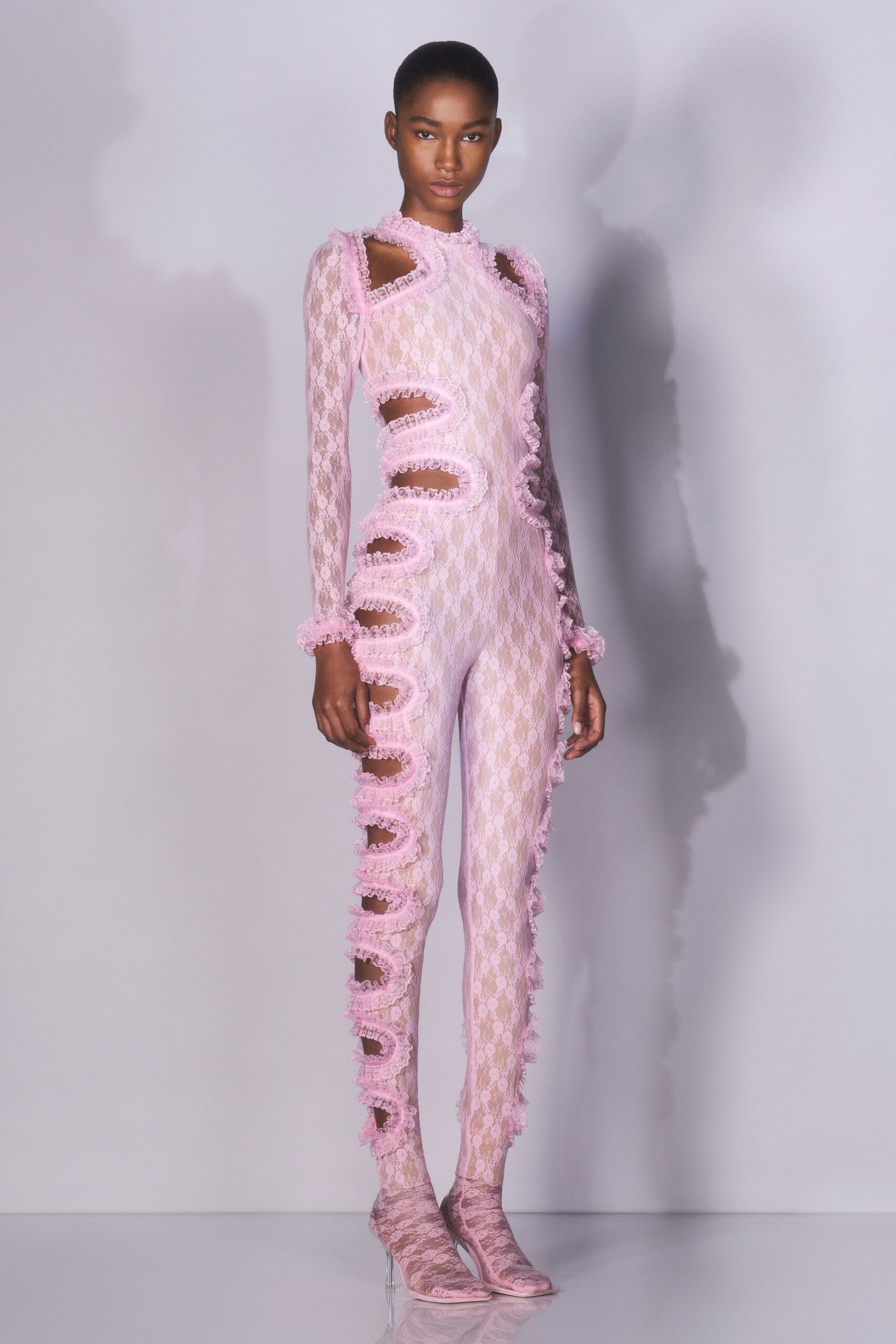 pink lace long-sleeve high-neck fitted ruffled sheer catsuit
