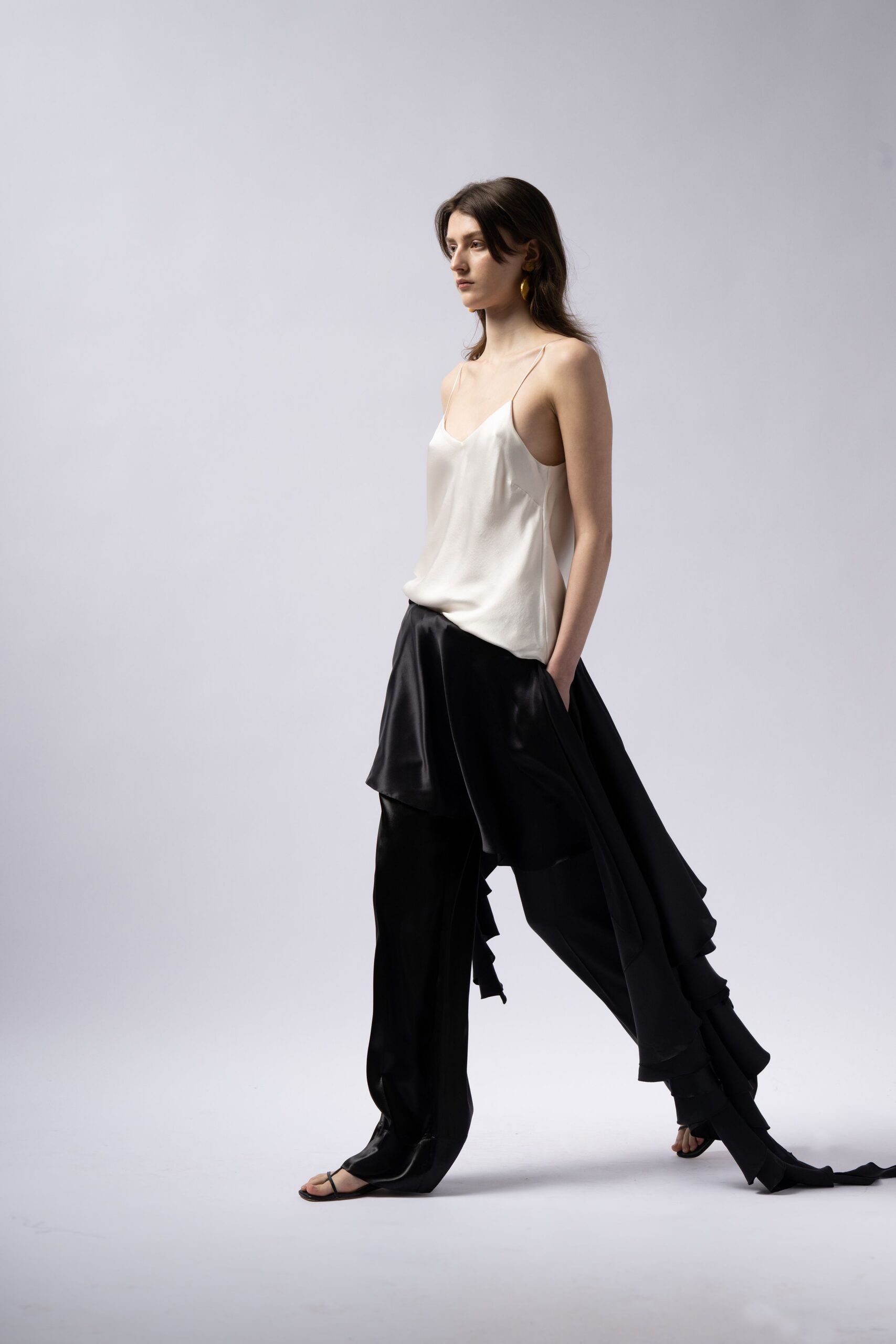 white silk top black layered pants