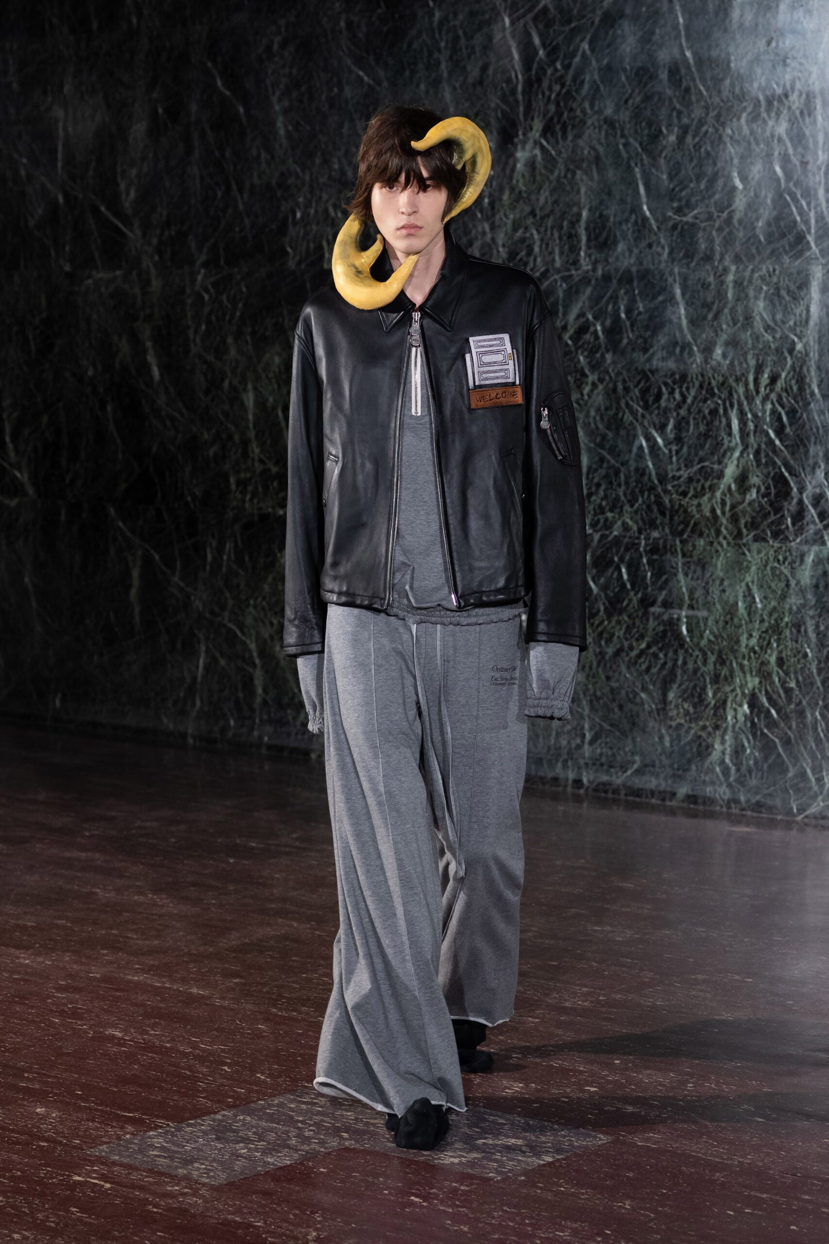 black leather jacket gray pants