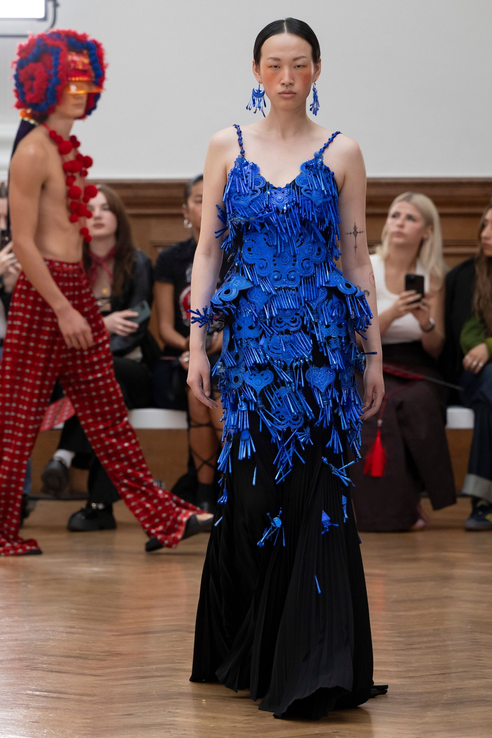 blue ruffled sleeveless gown