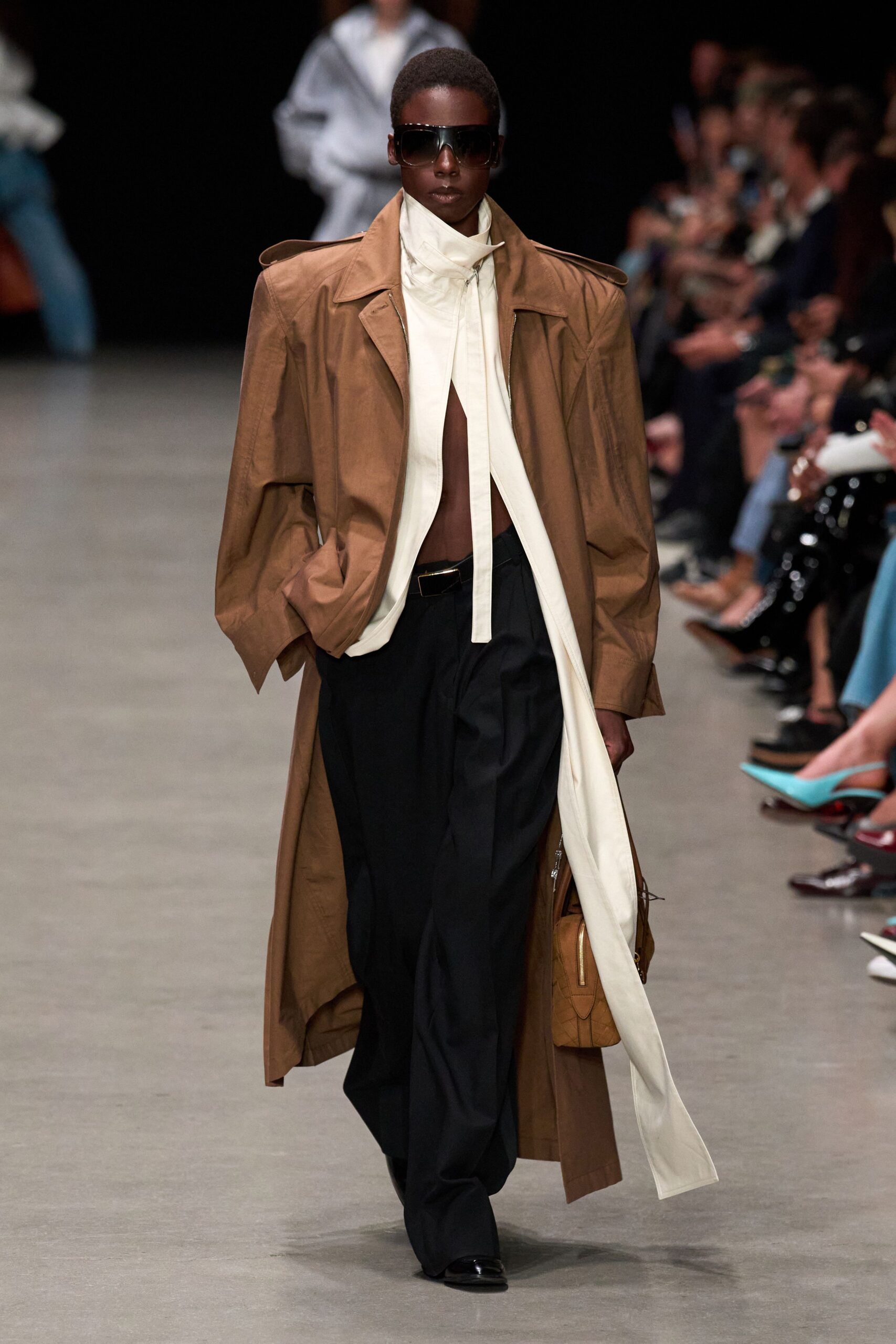 brown coat white shirt black pants