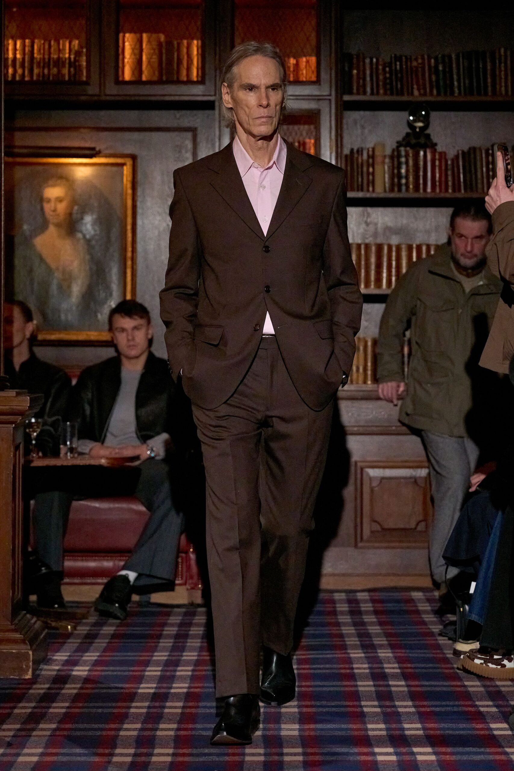 brown tailored suit with pink shirt