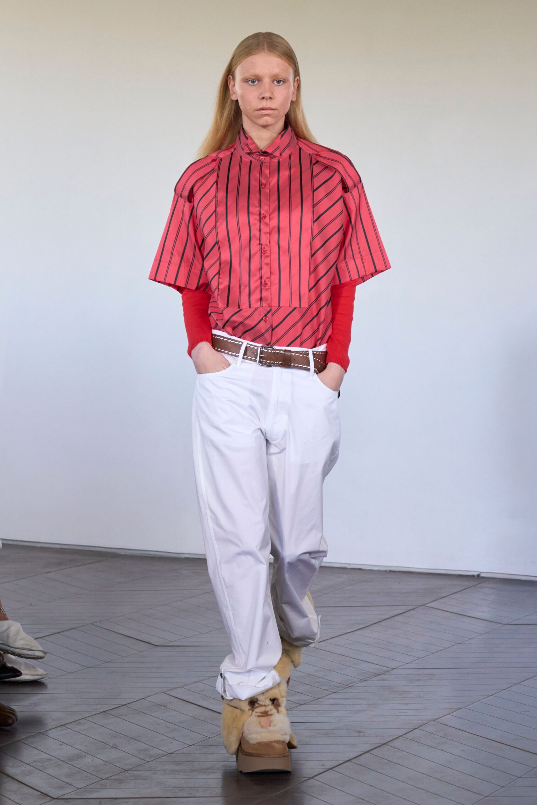 red striped shirt with white pants