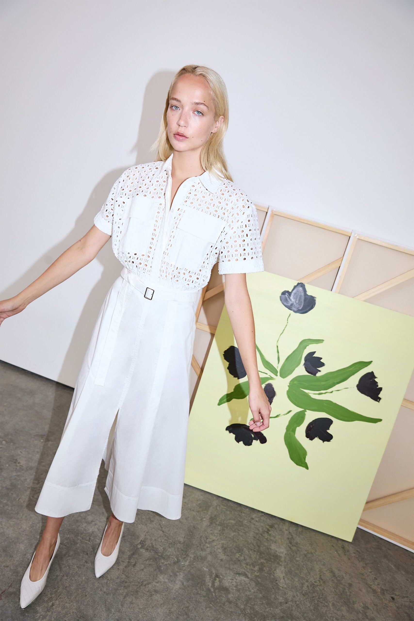 white cotton short-sleeve collared fitted pleated buttoned dress