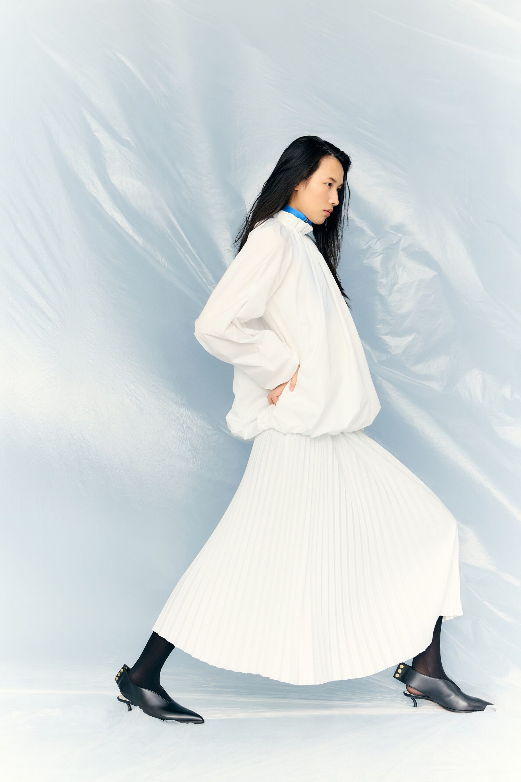 white pleated top and skirt