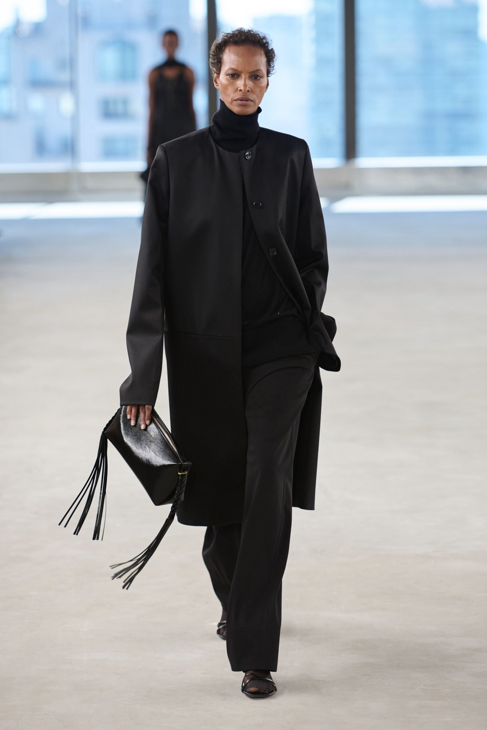 black oversized coat with tailored pants