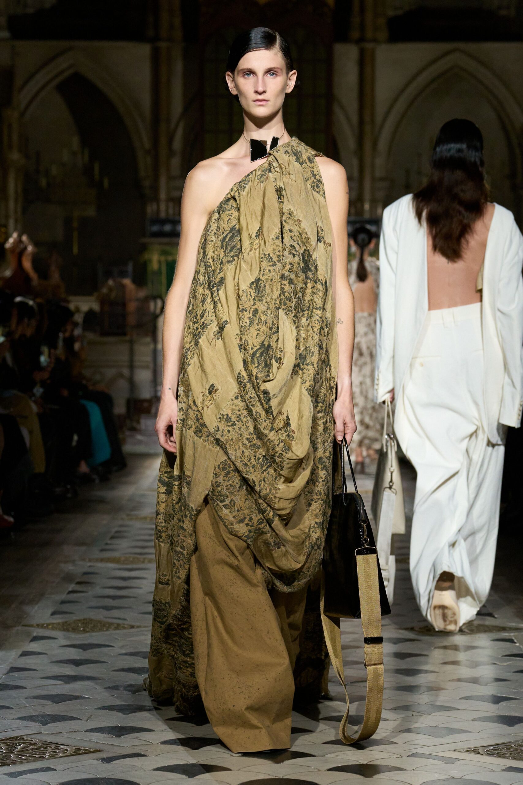 green silk sleeveless high-neck fitted draped flowing gown