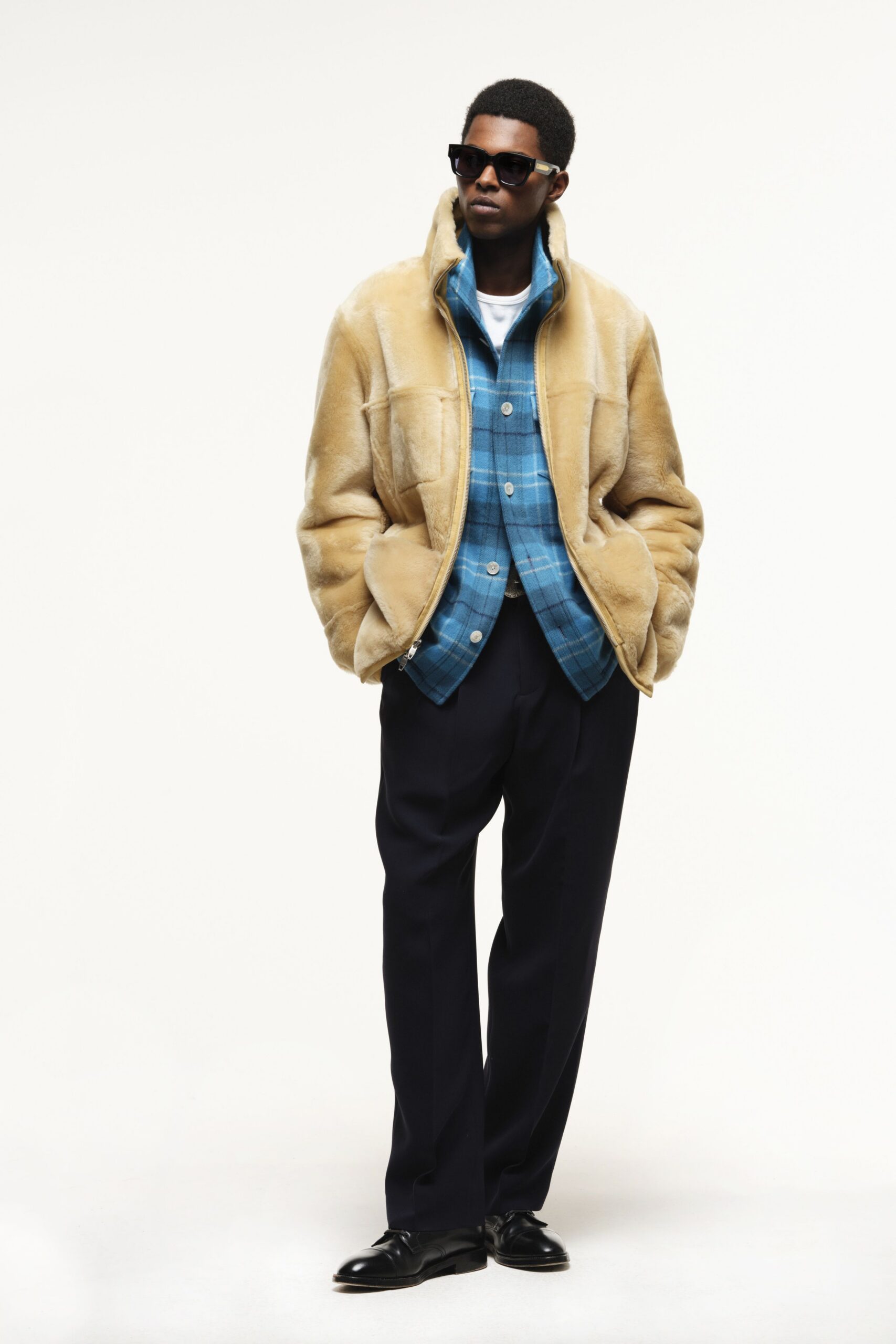 beige faux-fur jacket with blue checked shirt