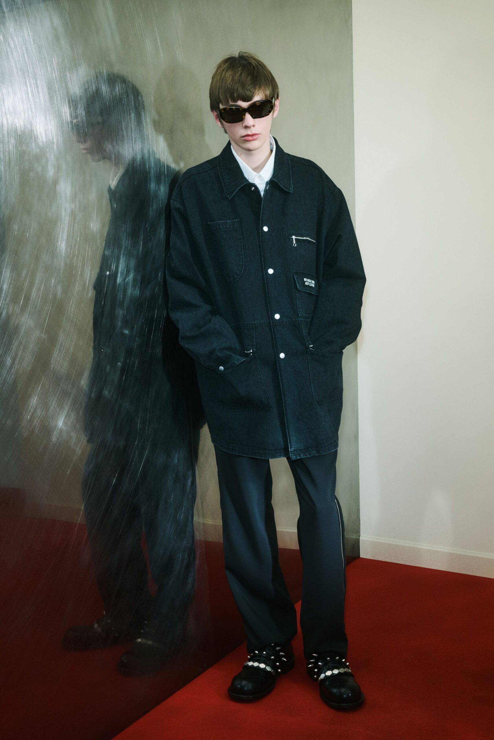 black denim jacket with gray pants