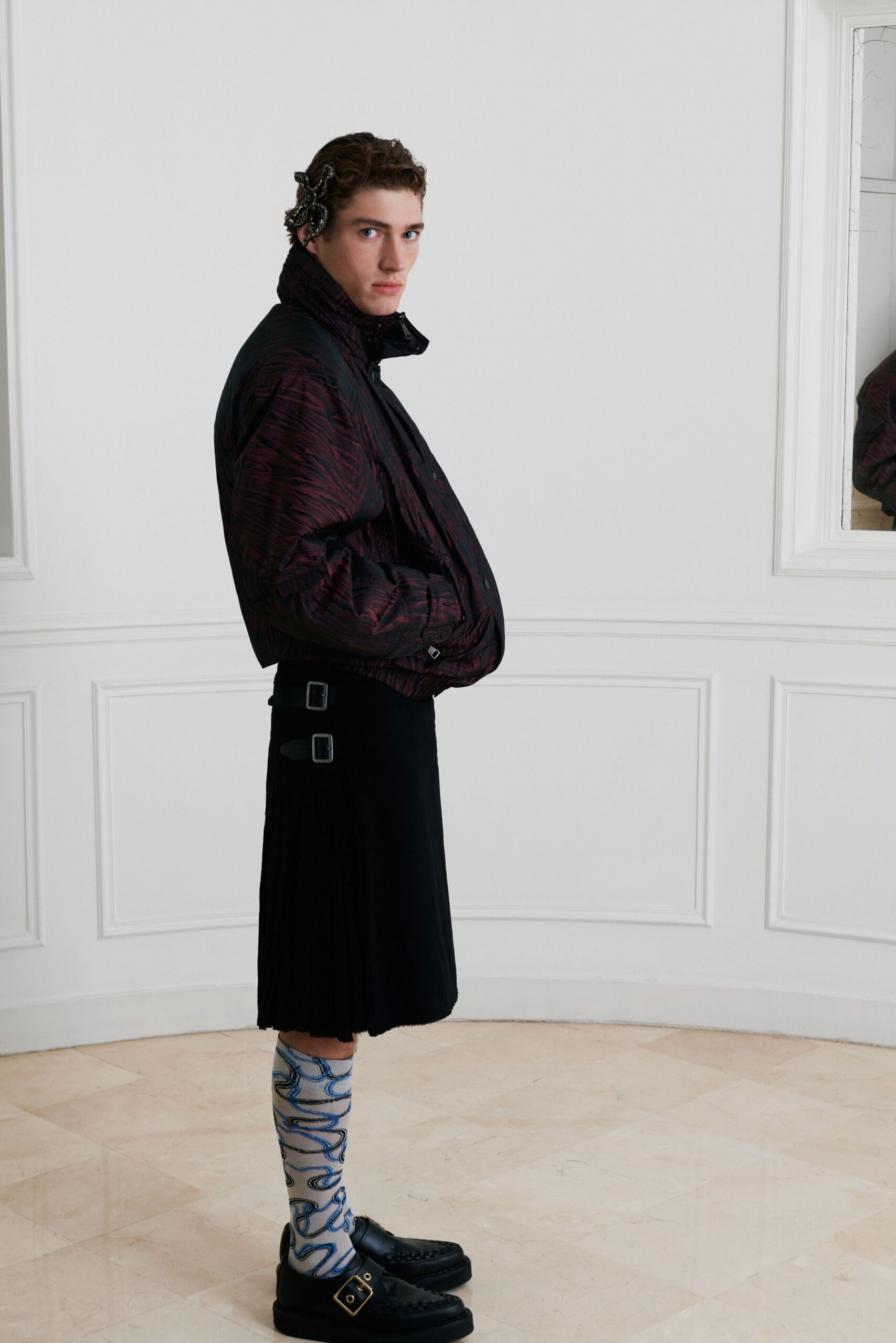 black relaxed jacket with pleated skirt