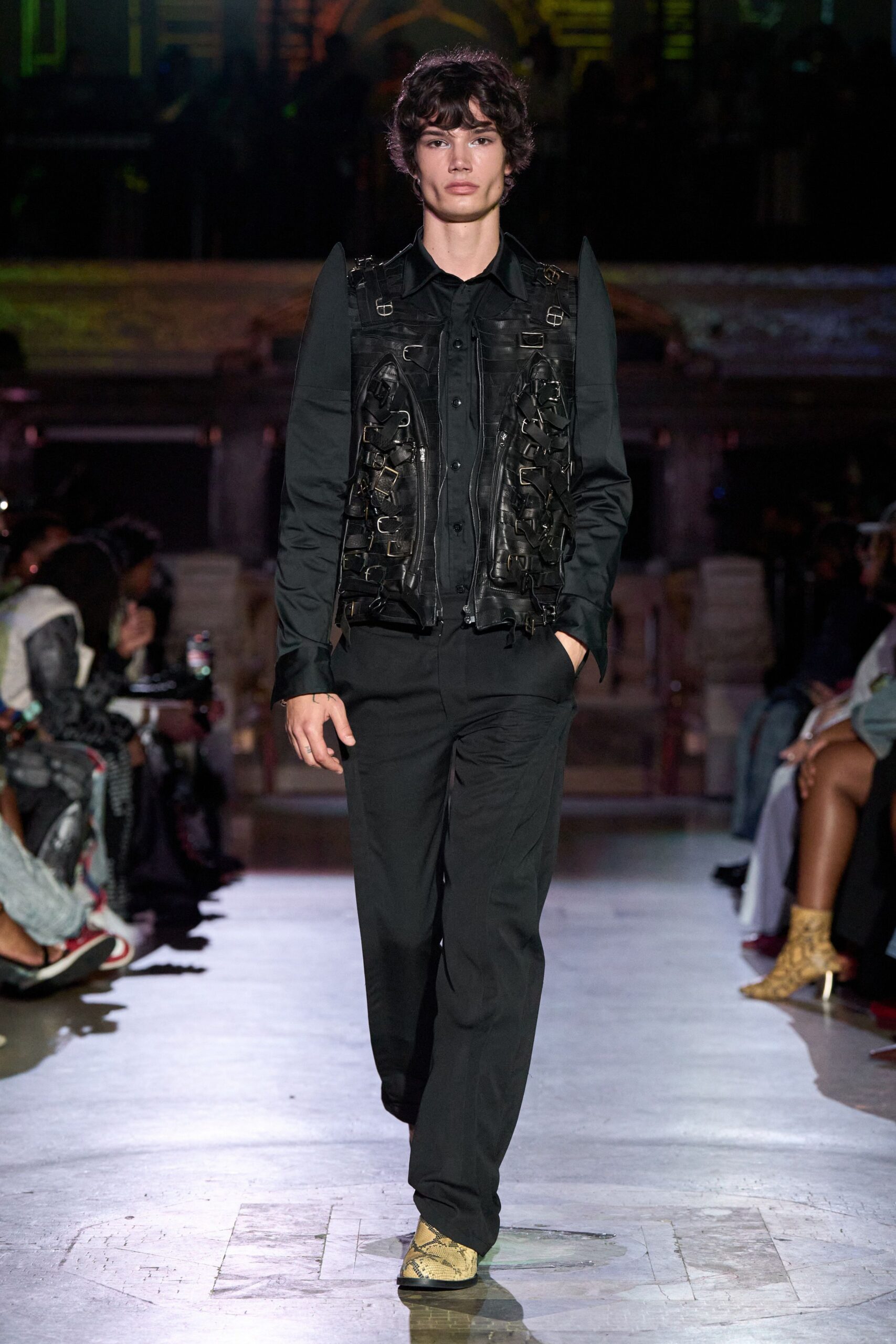 black leather vest with relaxed pants