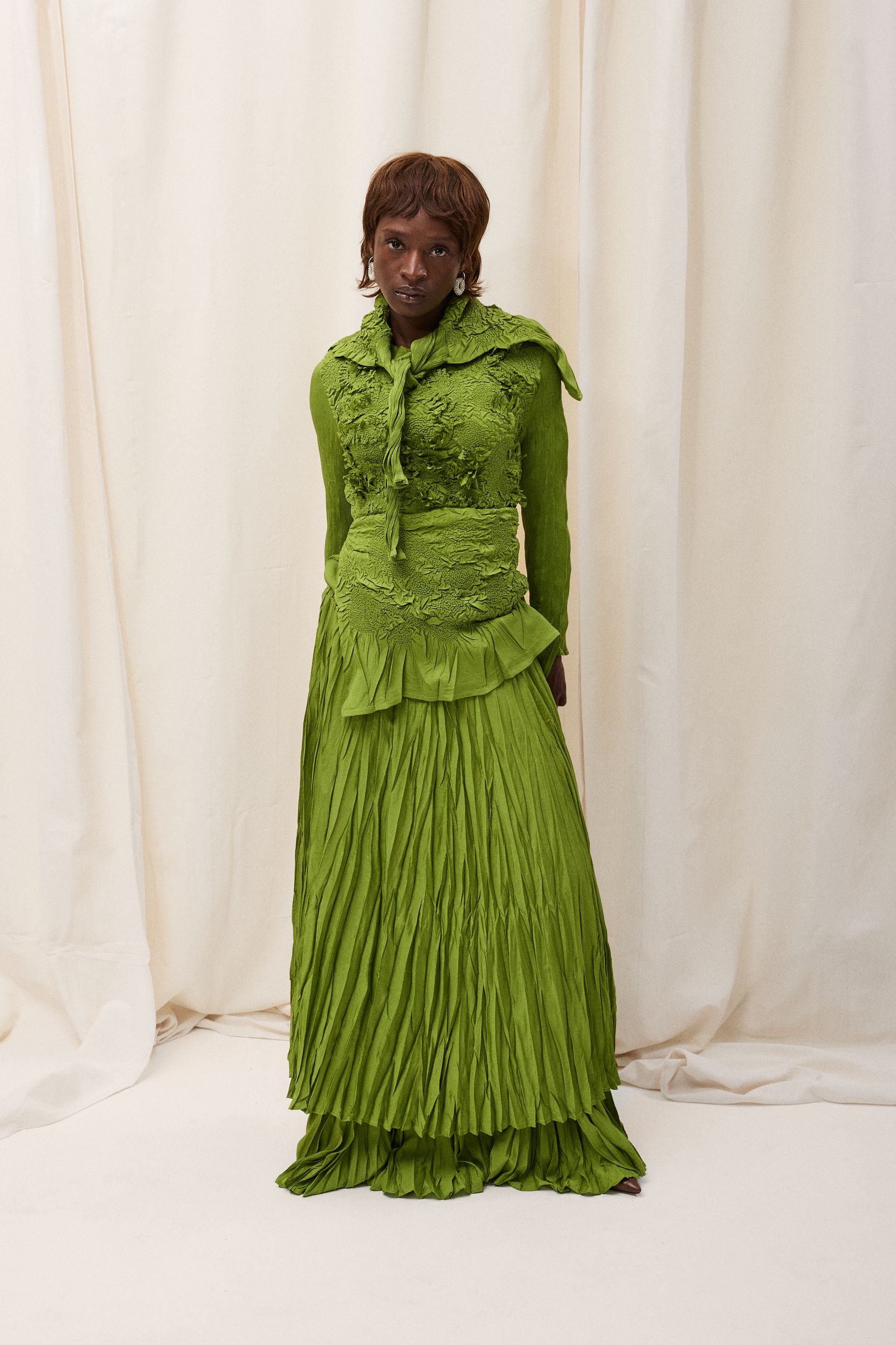 green pleated long-sleeve dress