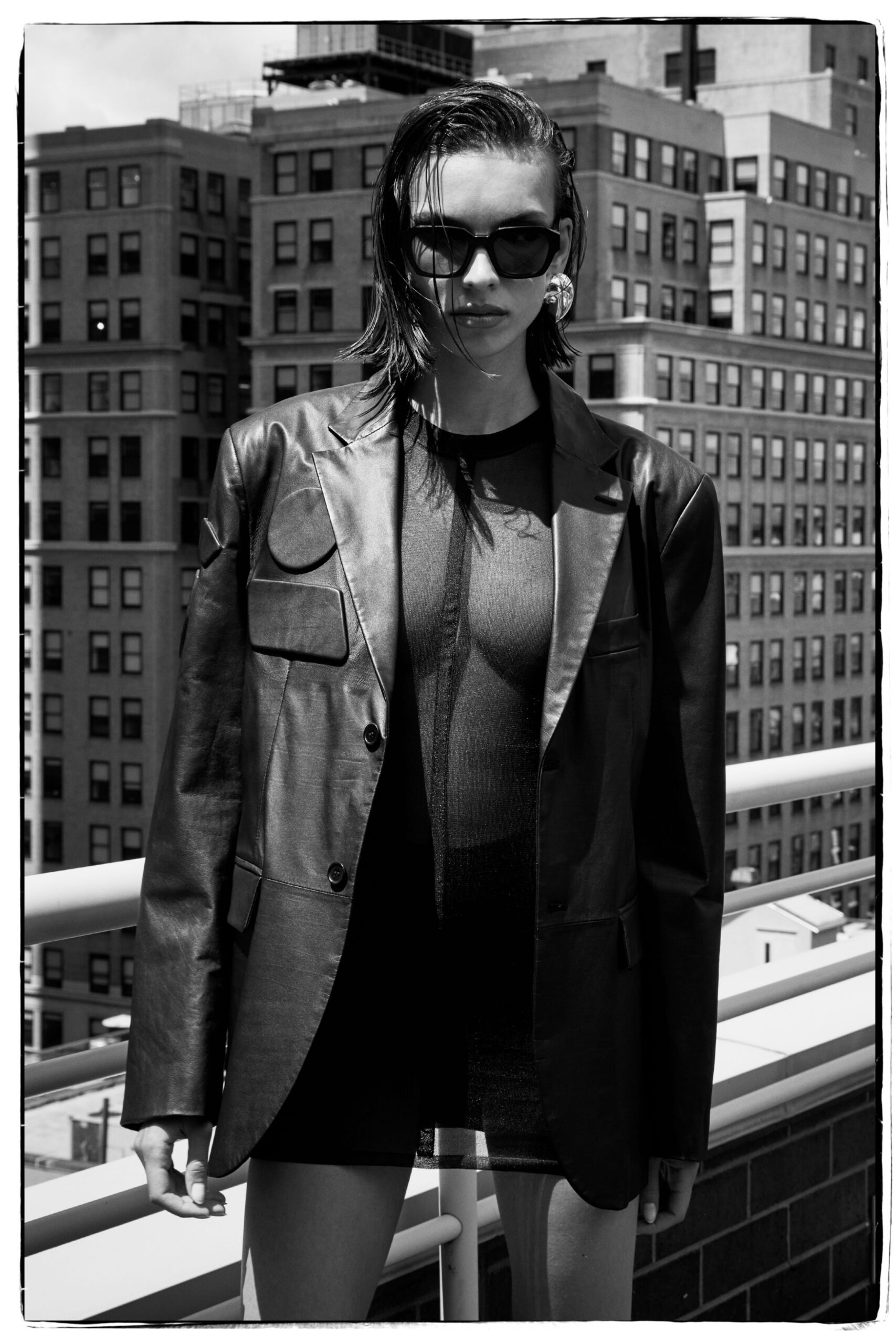black leather long-sleeve collared structured blazer