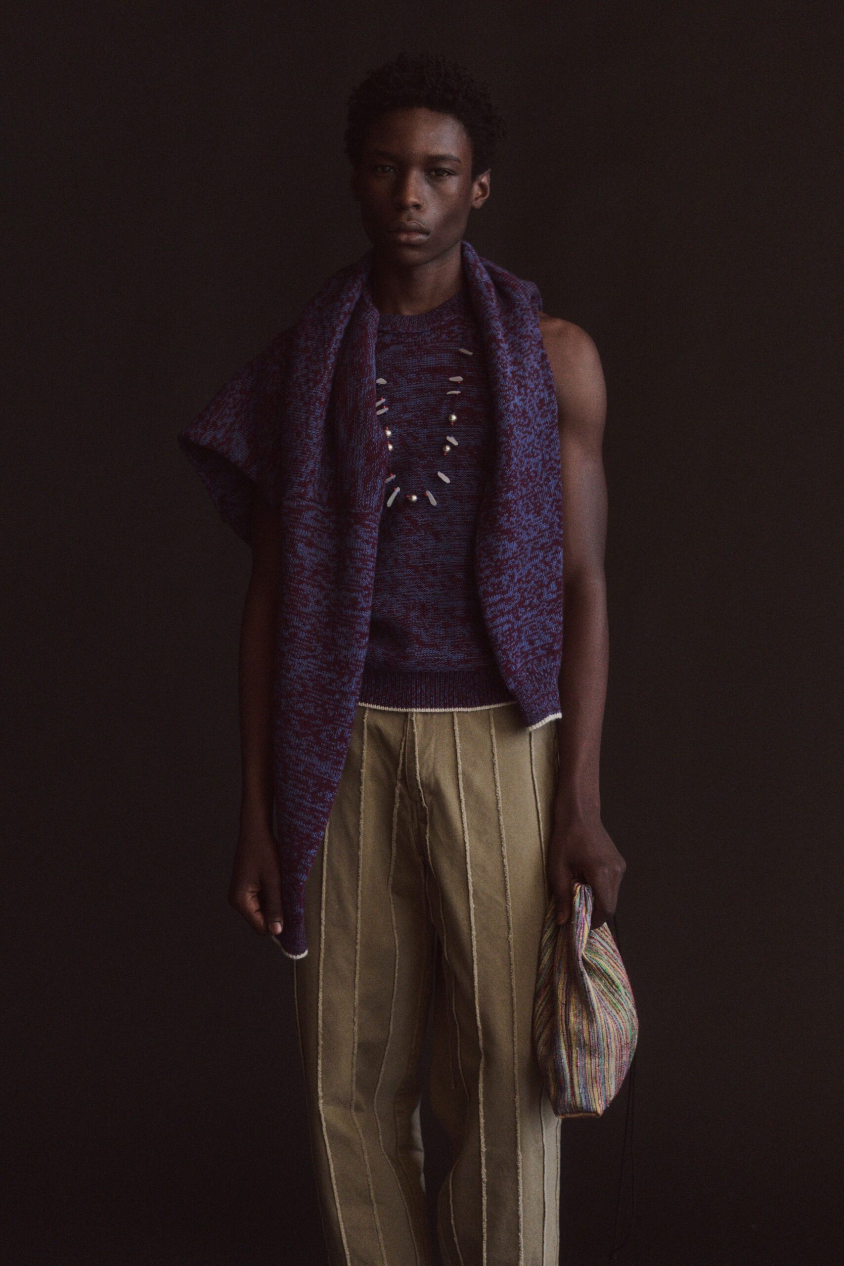 purple wool sleeveless top with striped pants