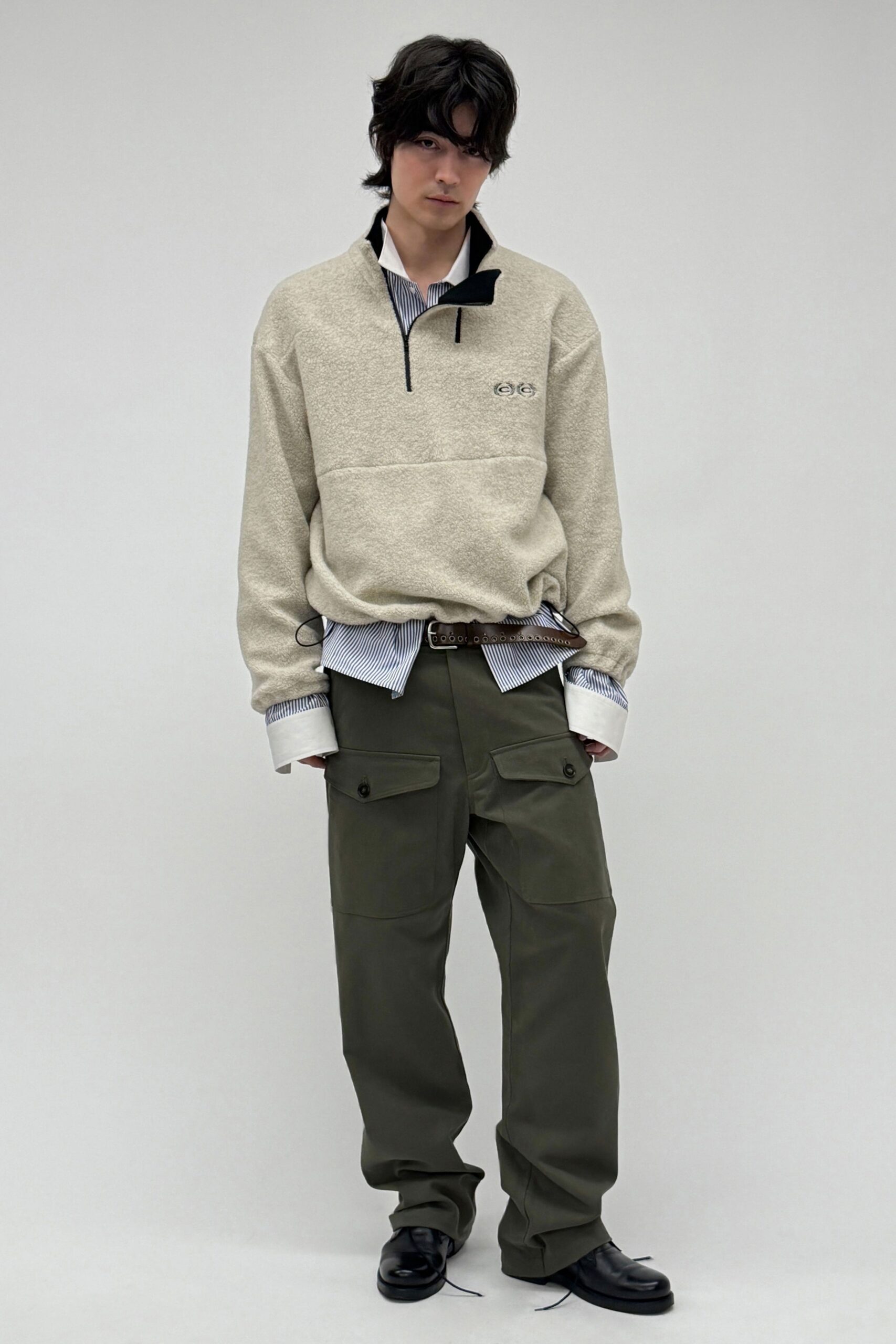 beige relaxed sweater with cargo pants