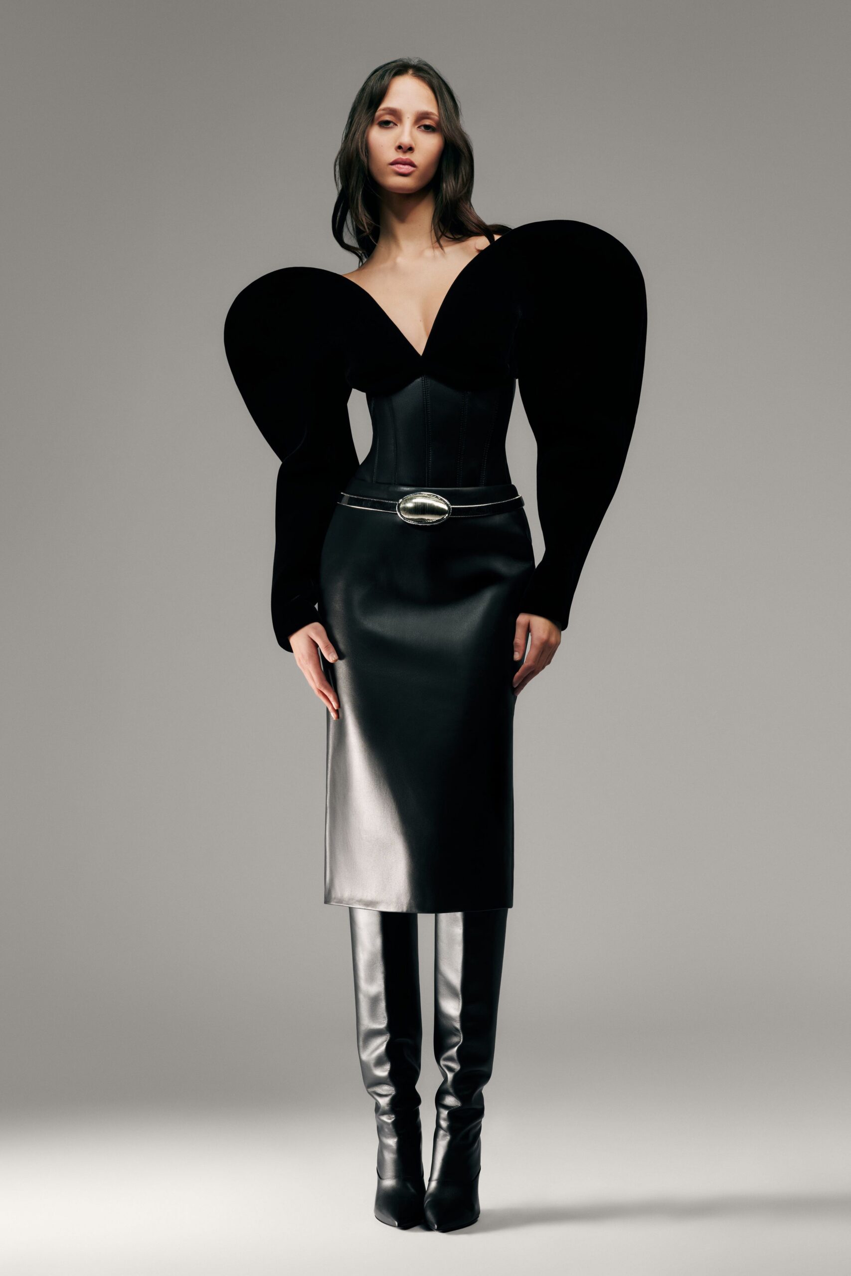 black leather fitted dress with boots