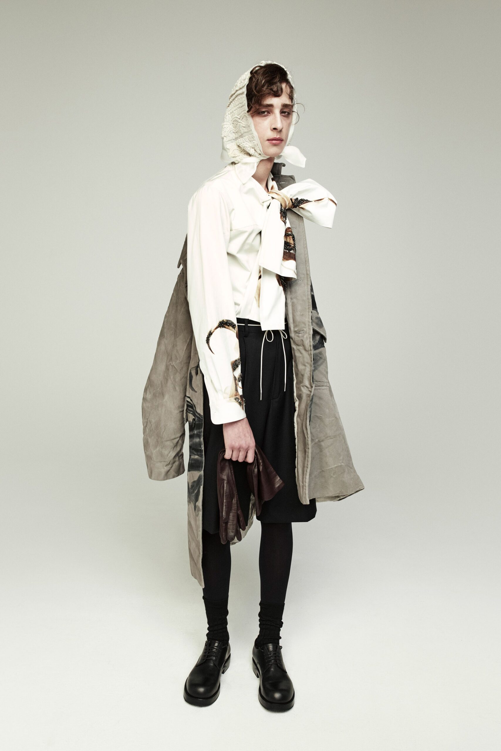 white relaxed shirt with gray coat