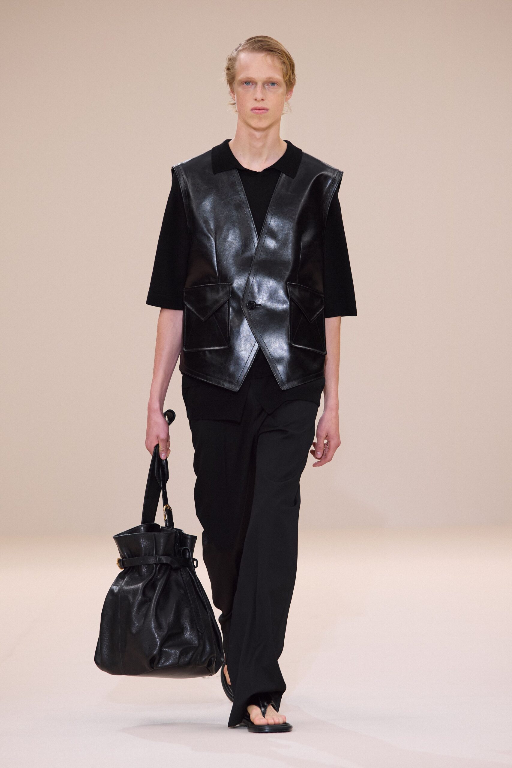 black leather vest and pants