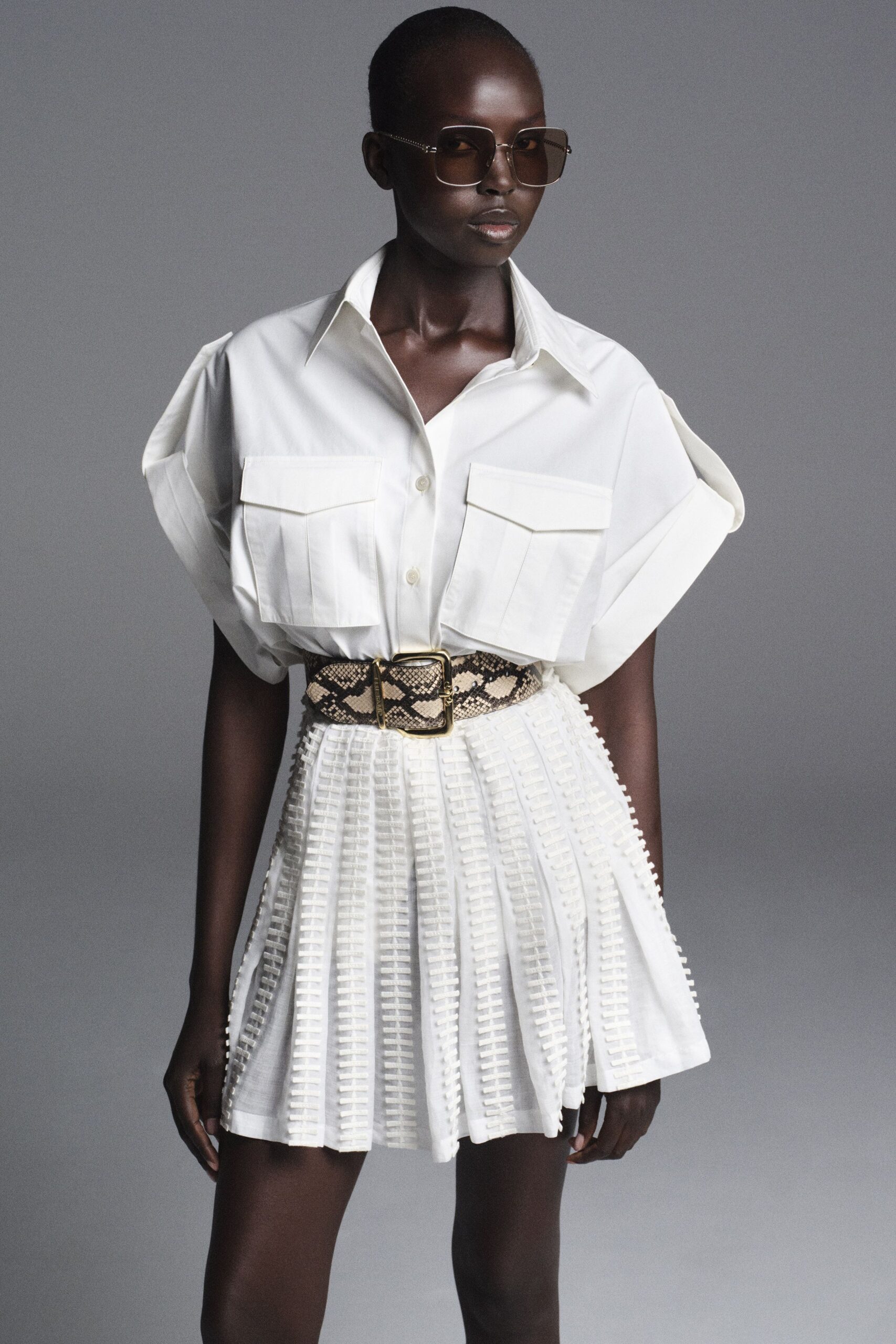 white shirt and pleated skirt
