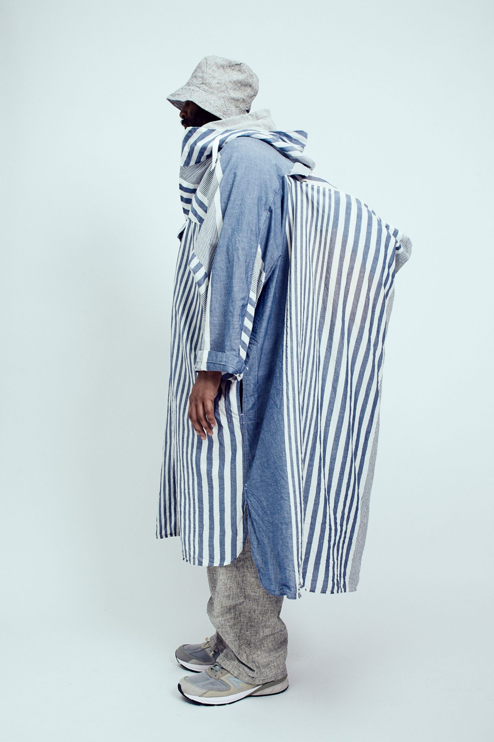 blue cotton long-sleeve collared relaxed striped draped coat