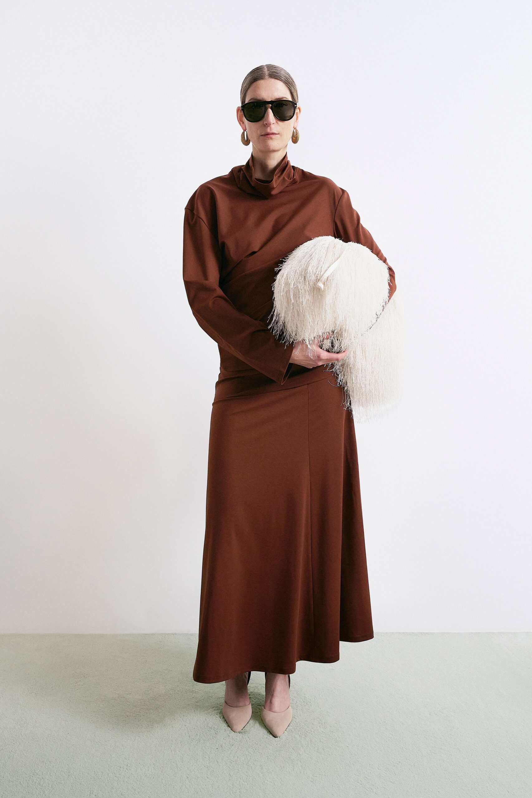 white fur fringed bag