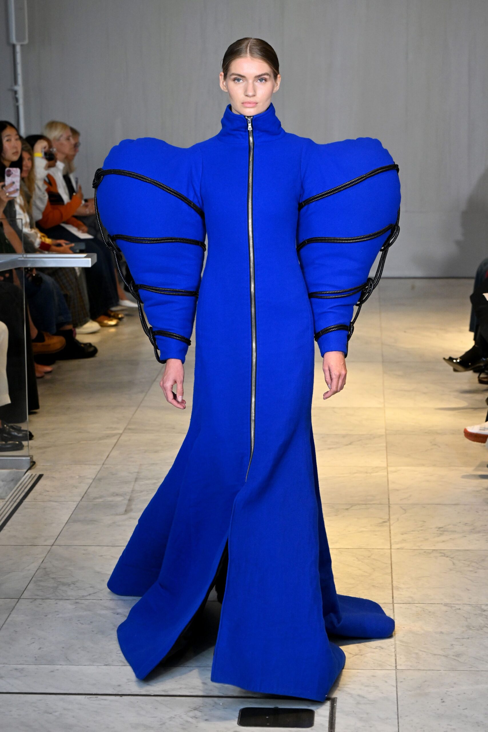 blue fitted gown with padded sleeves