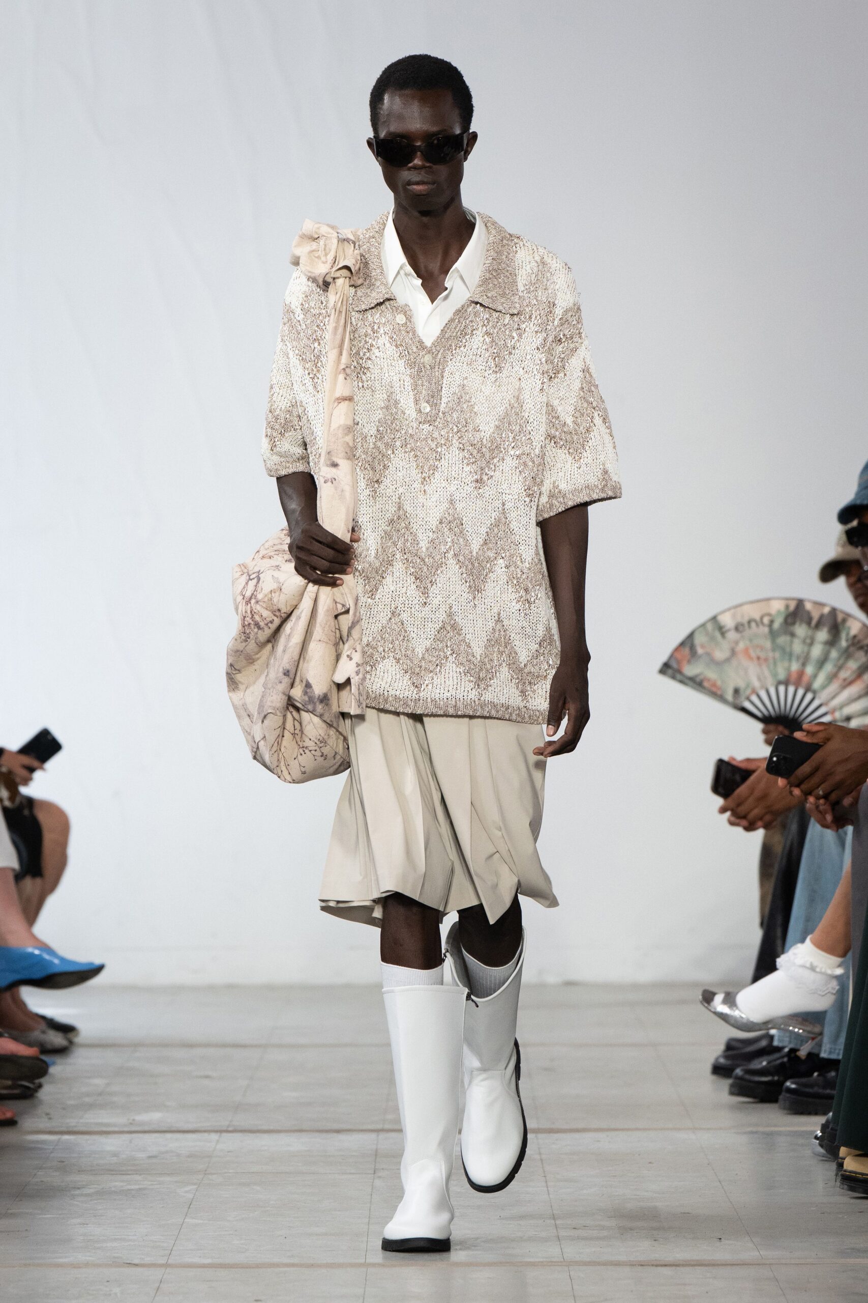 beige zigzag top with white skirt
