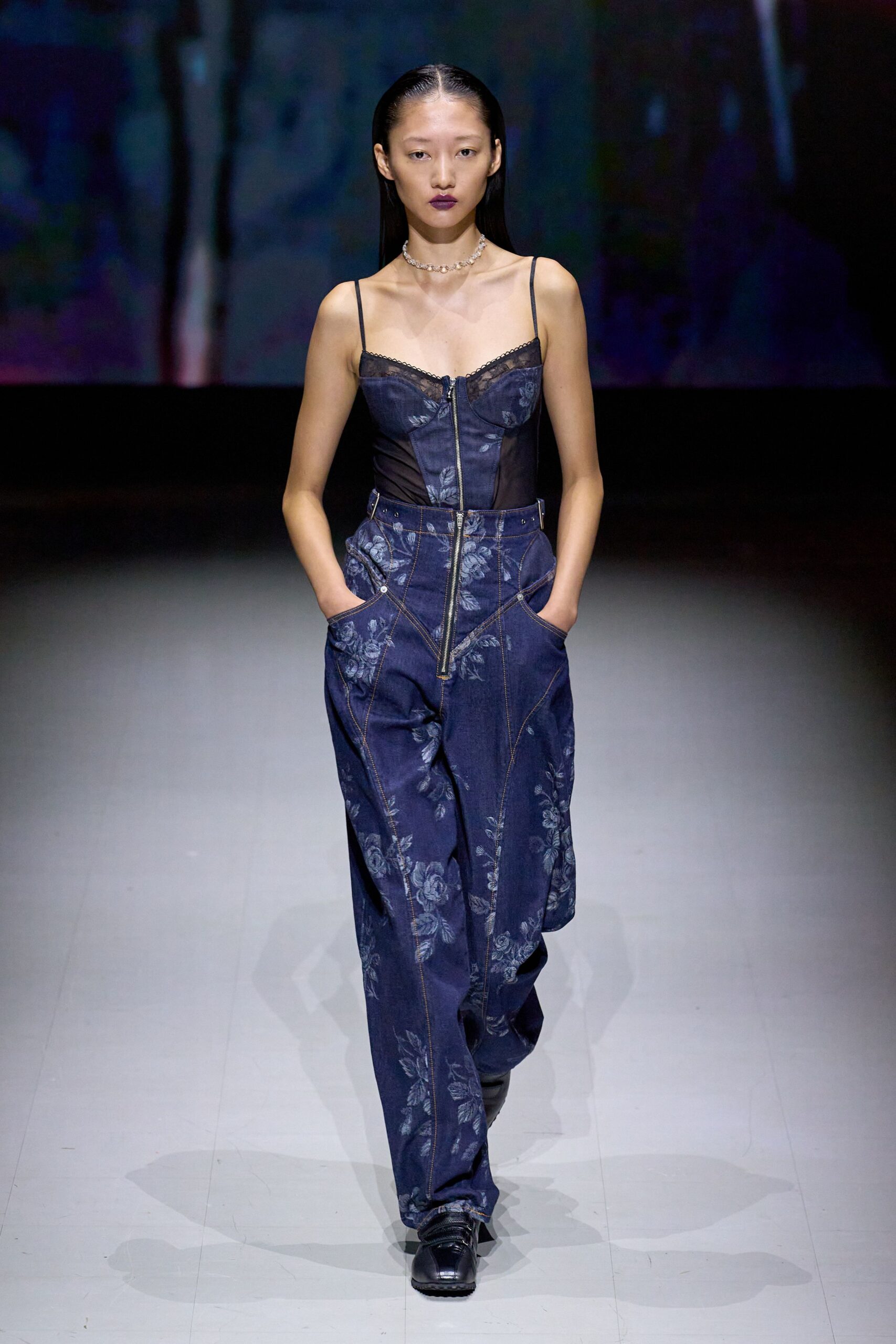 blue denim sleeveless v-neck fitted zippered flared jumpsuit