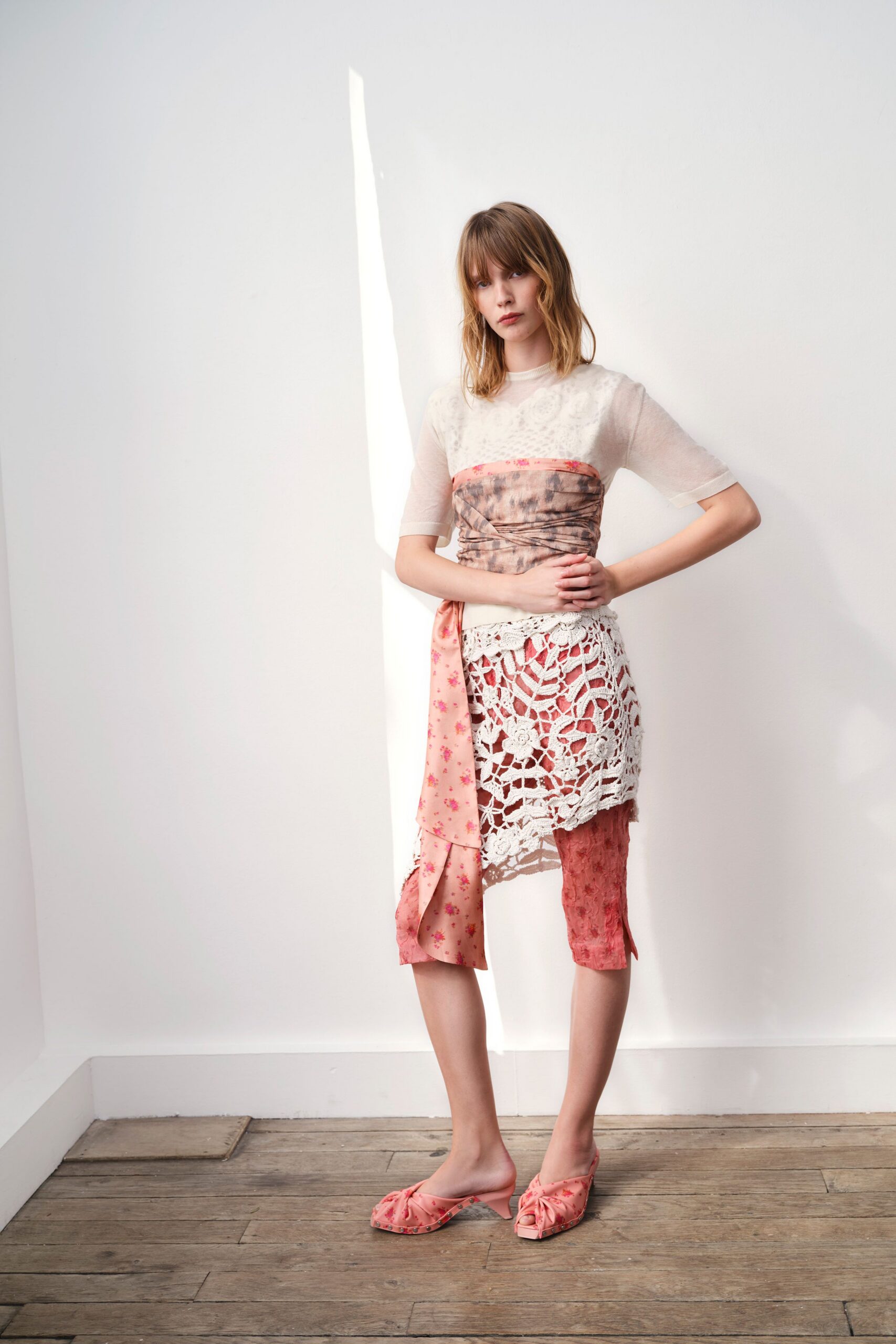 white silk fitted top with pink lace skirt
