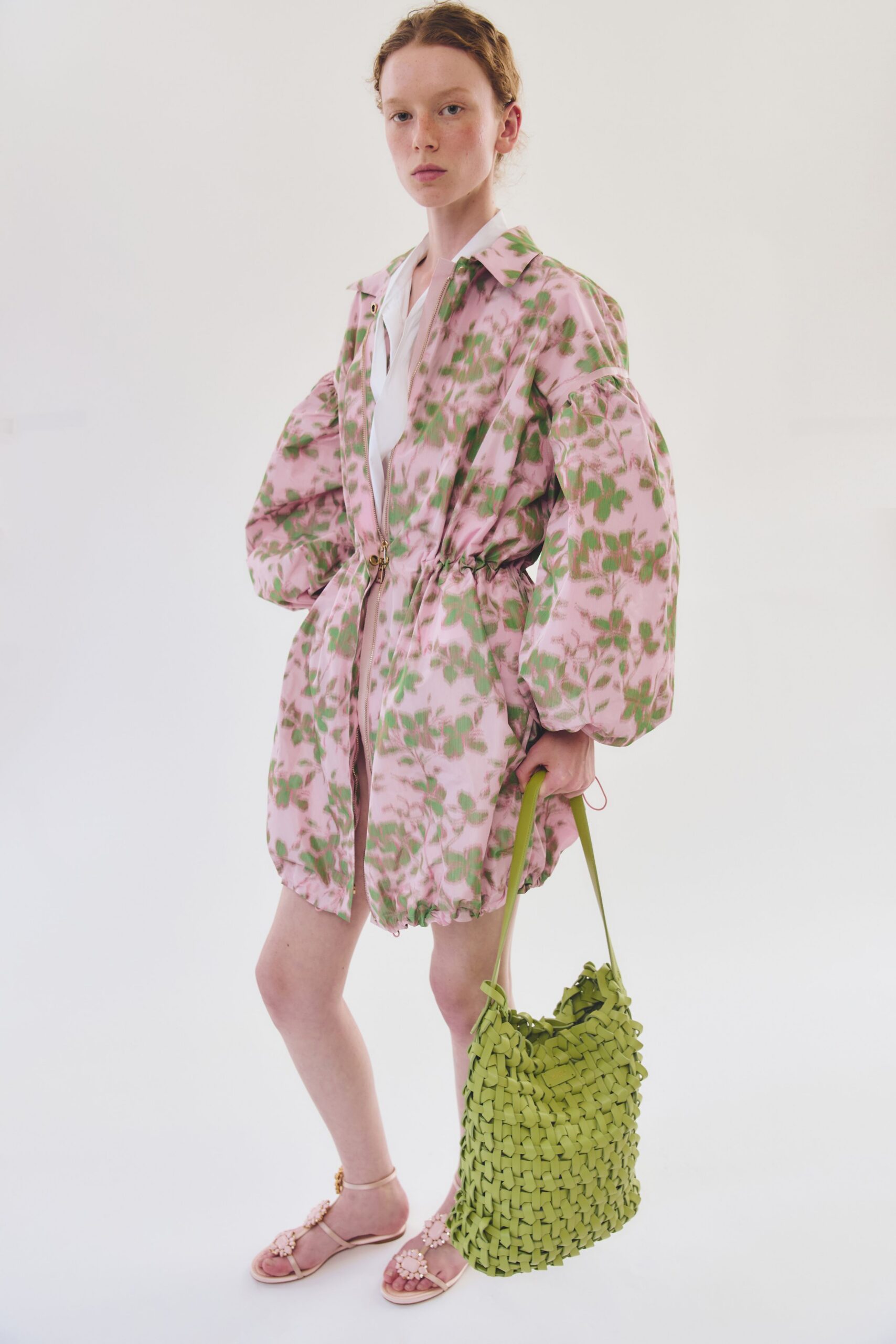 floral pink short dress with green bag