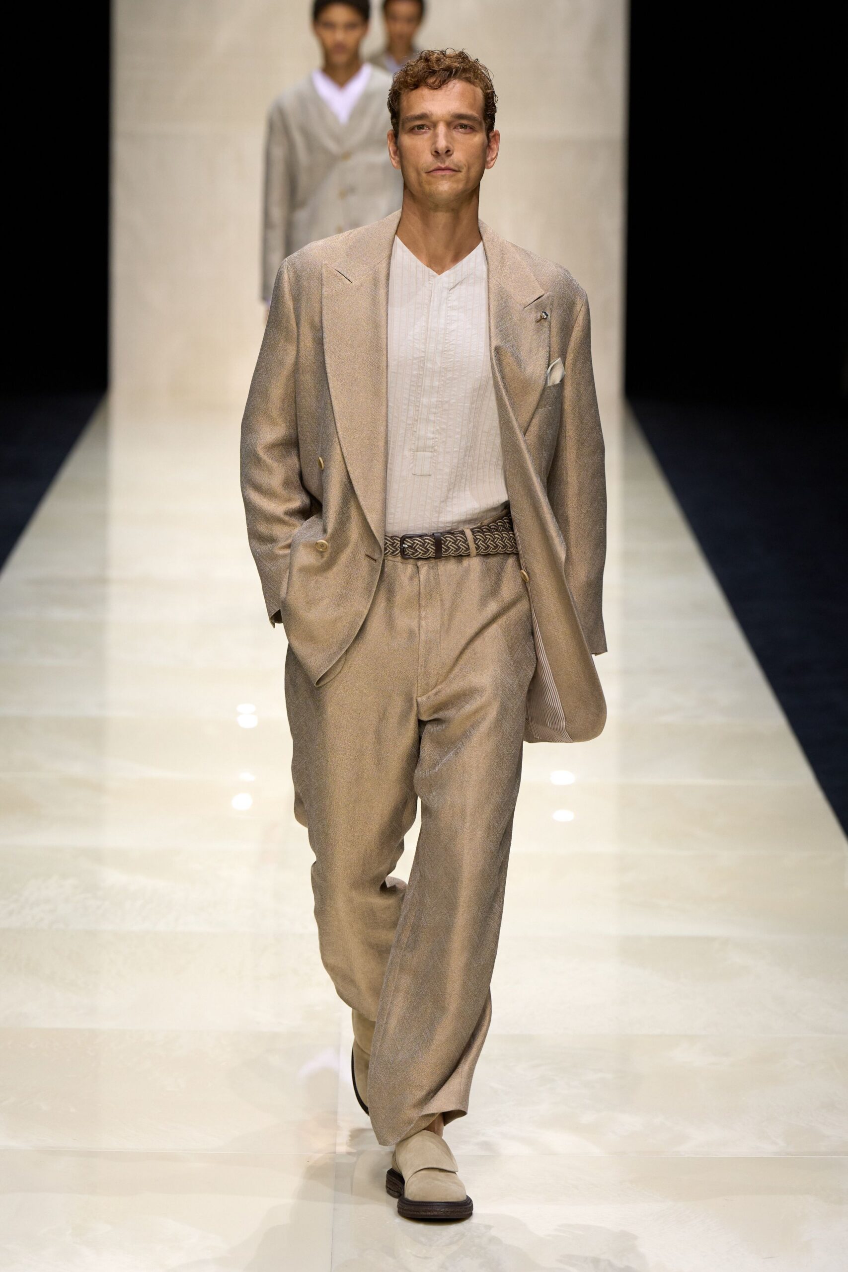 beige tailored suit with white shirt