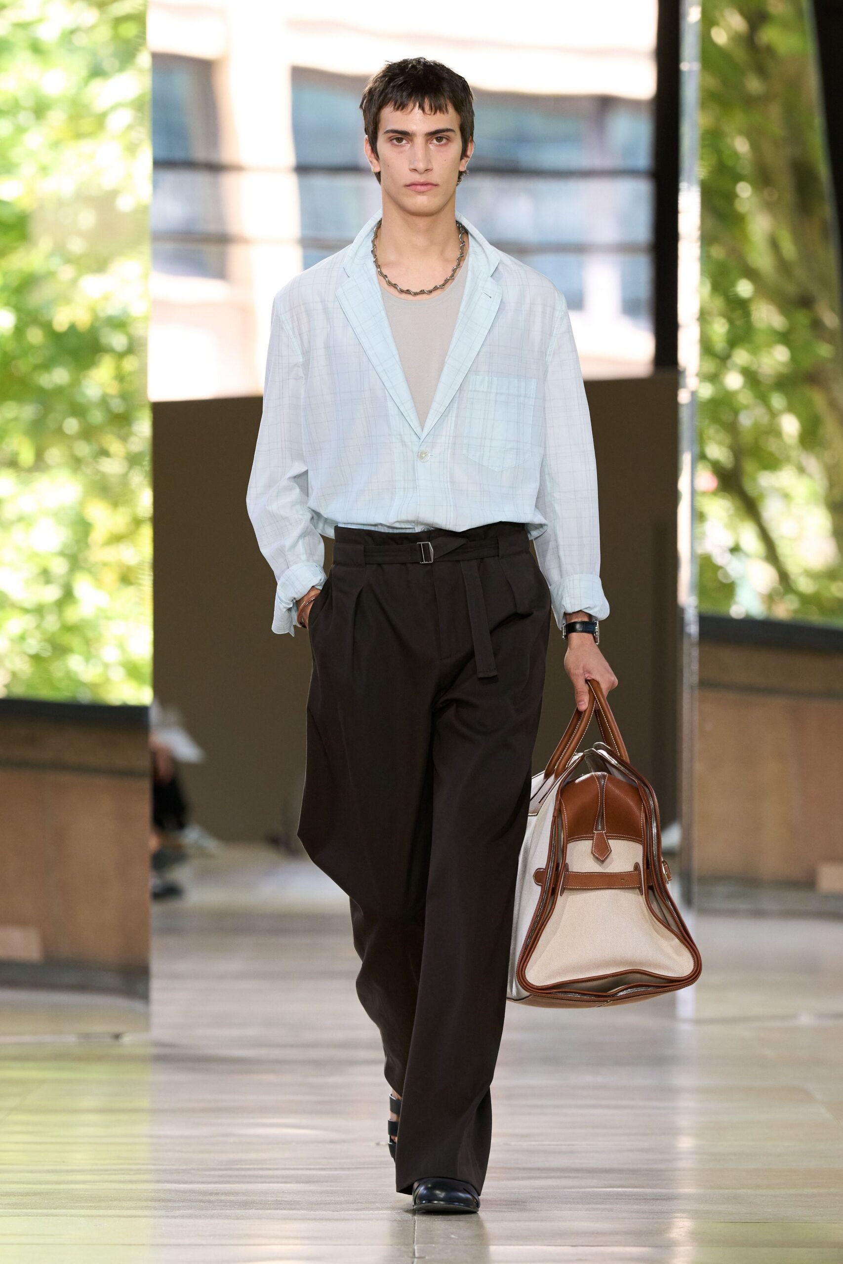 light blue shirt with black pants