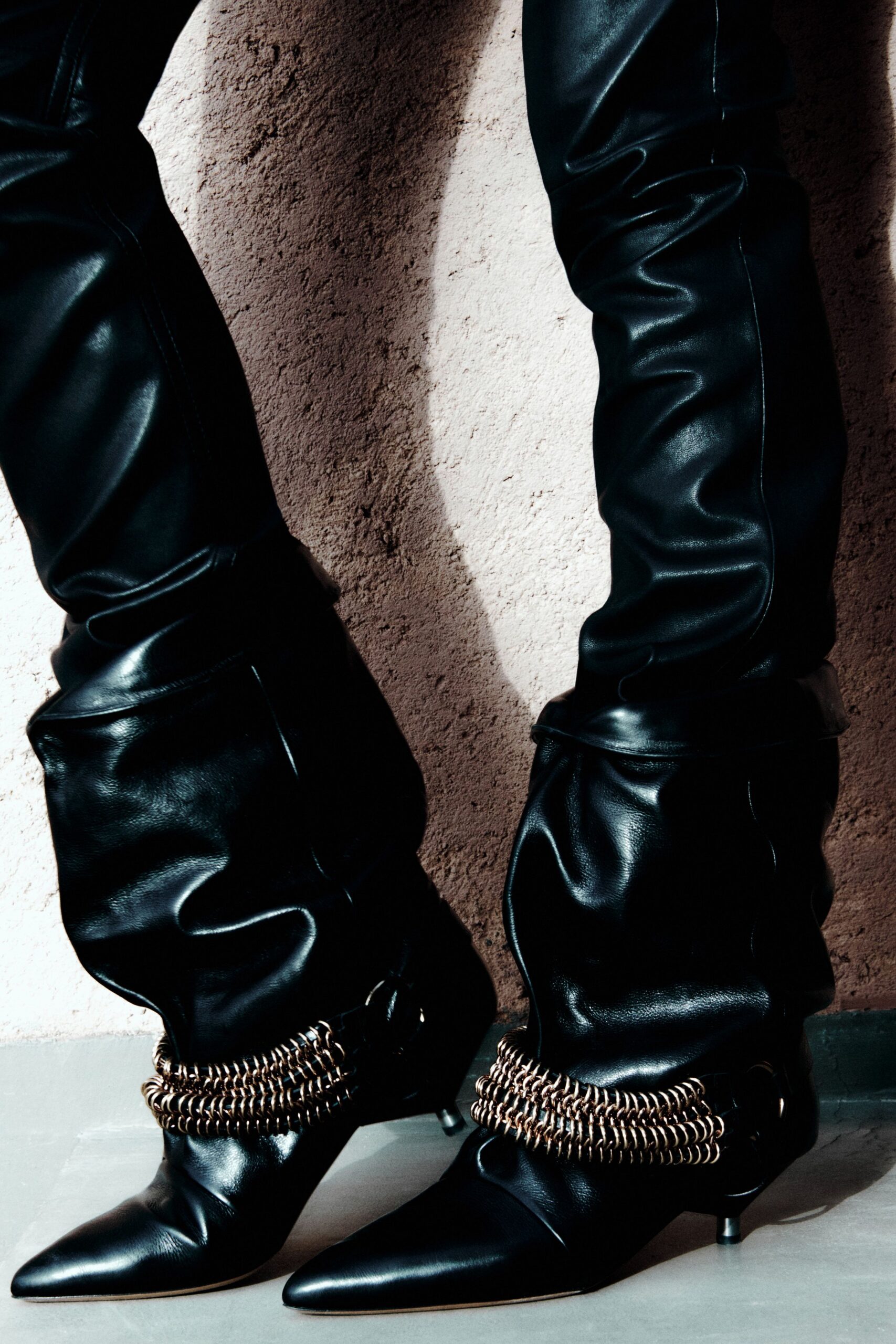 black leather fitted pants and boots
