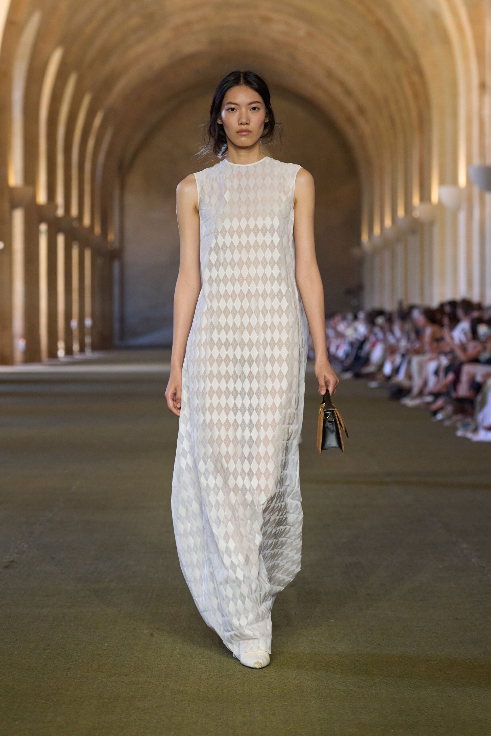 white chiffon sleeveless high-neck fitted layered gown