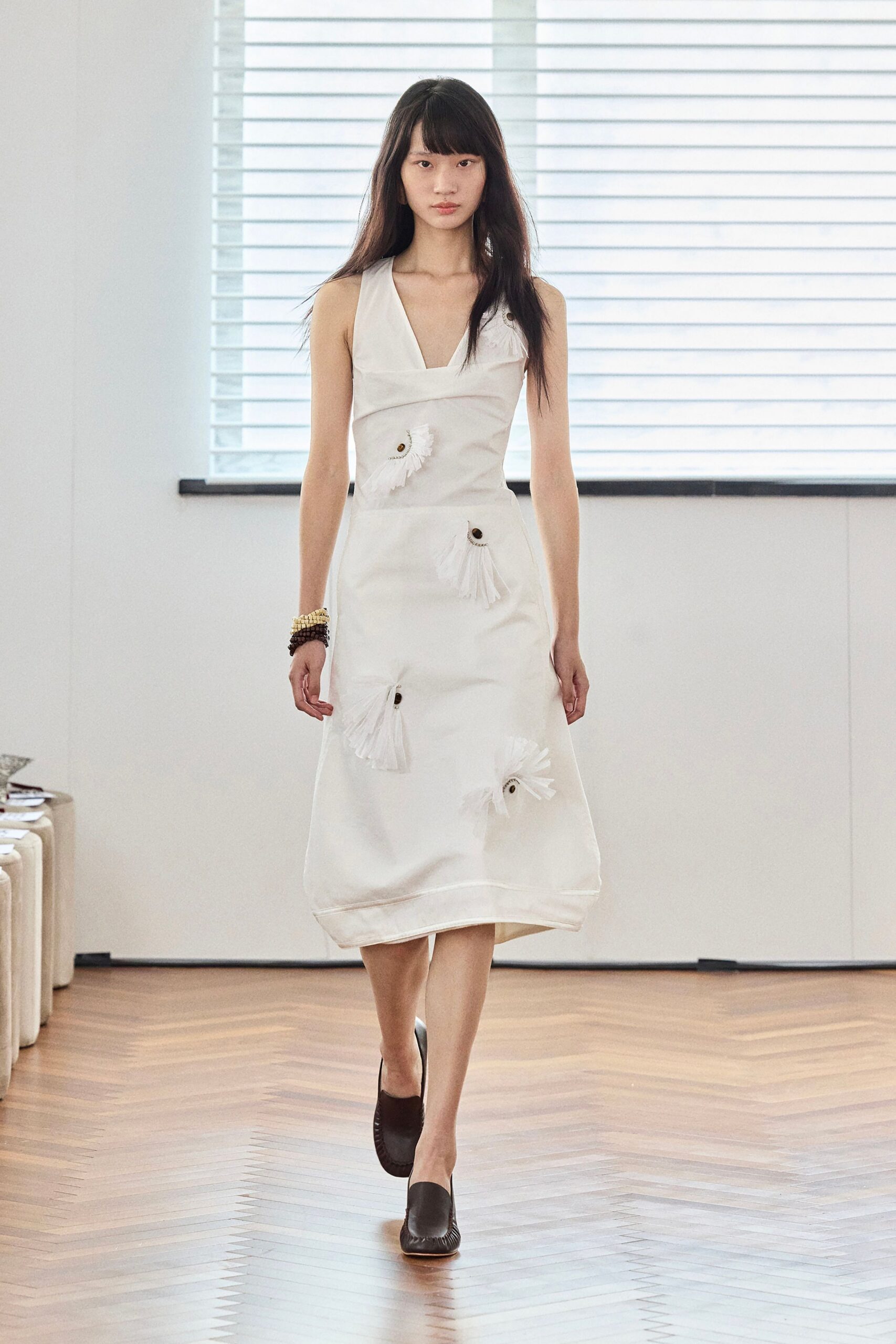 white fitted midi dress with pleats