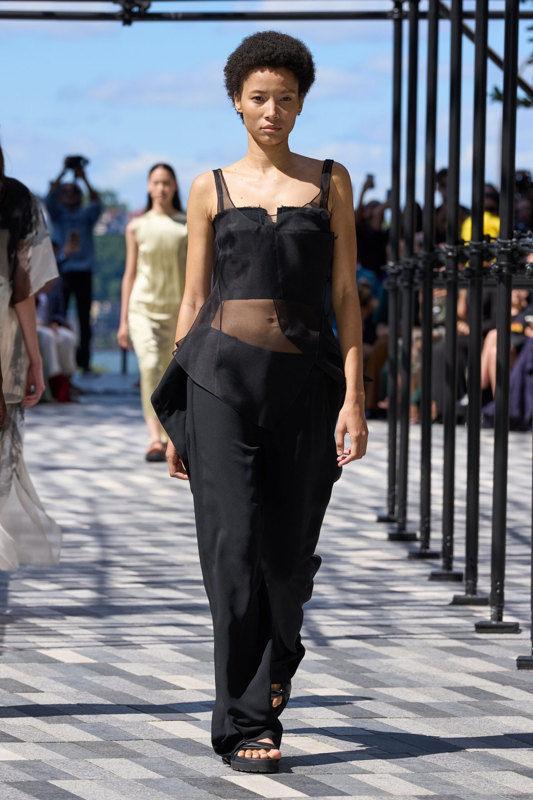 black silk sleeveless v-neck fitted pleated draped jumpsuit
